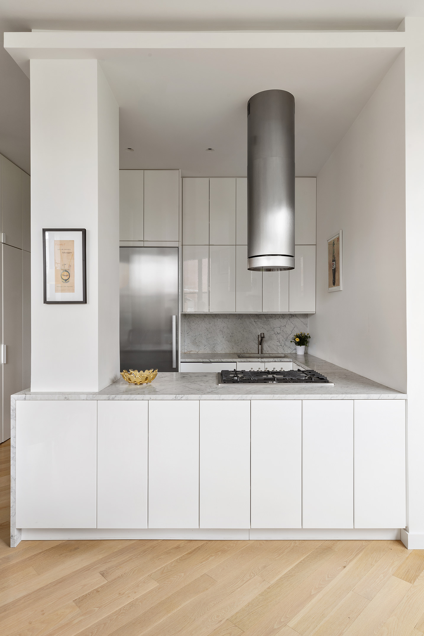 372 Dekalb Avenue, Unit 5J Brooklyn, NY 11205 - Photo 4 of 10 a kitchen with stainless steel appliances granite countertop a sink a stove and a refrigerator