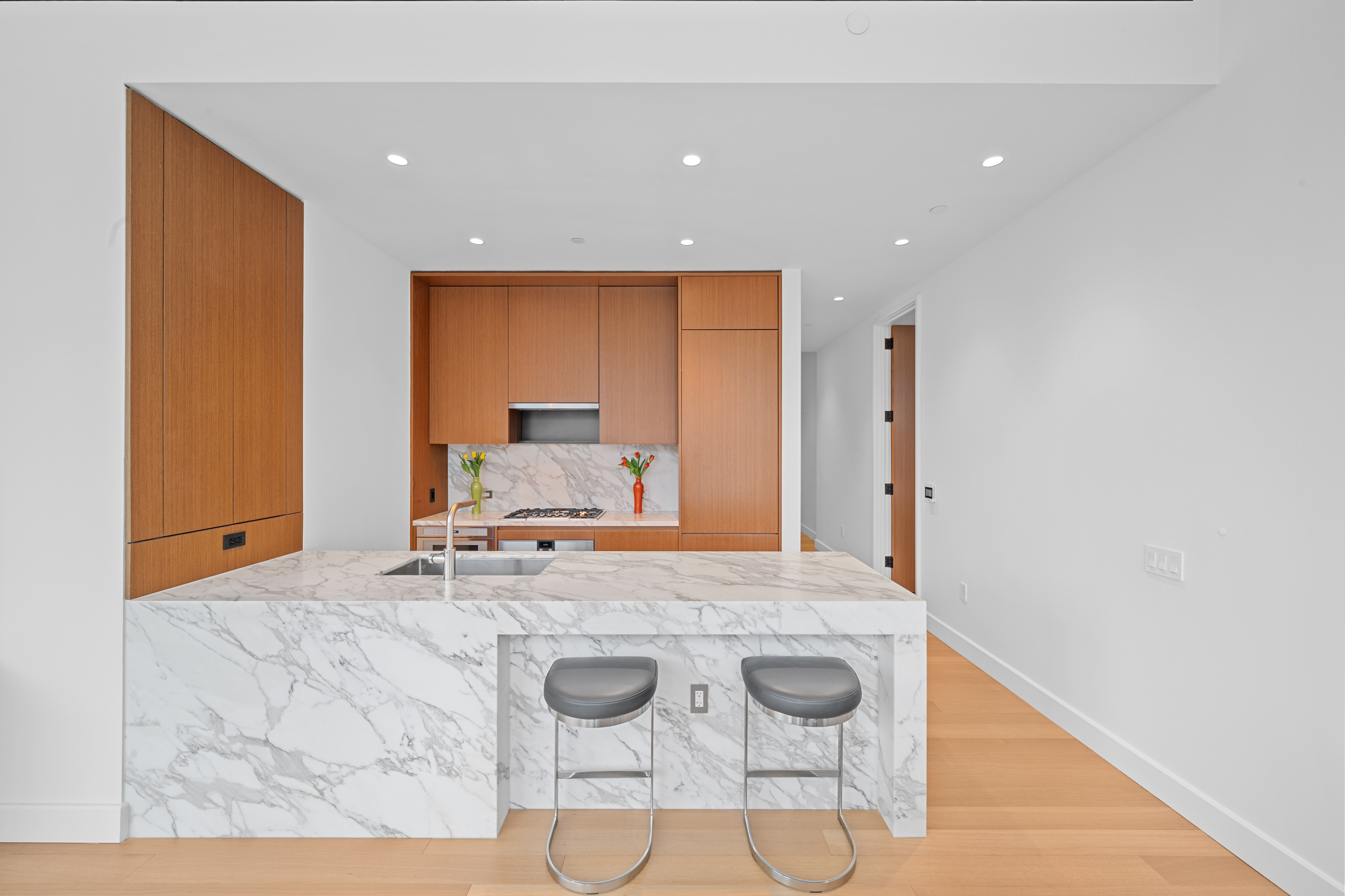 15 East 30th Street, Unit 19B Manhattan, NY 10016 - Photo 15 of 40 a view of kitchen with wooden floor