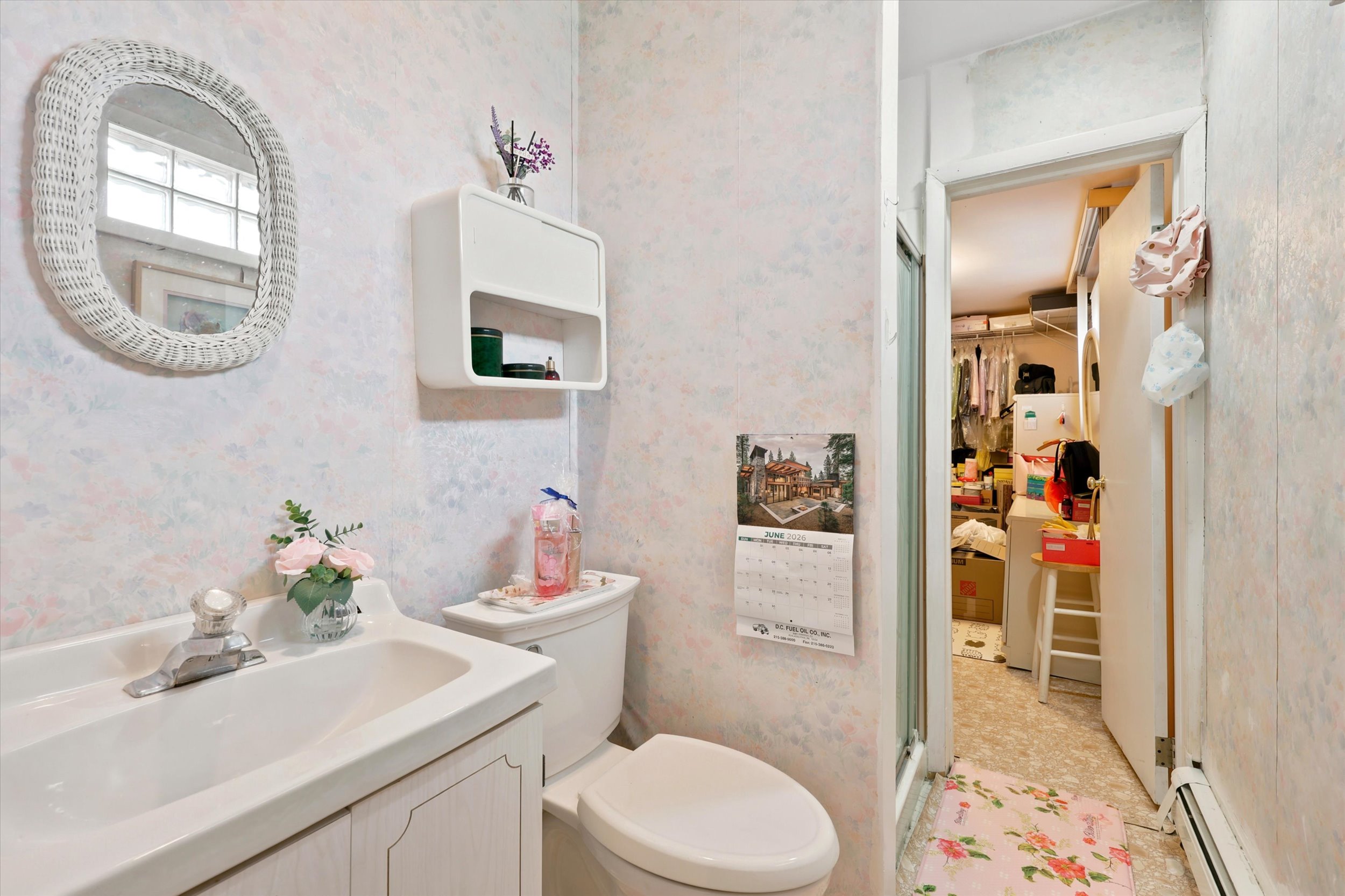 897 Pine Hill Avenue Philadelphia, PA 19115 - Photo 21 of 22 a bathroom with a toilet a sink and a mirror