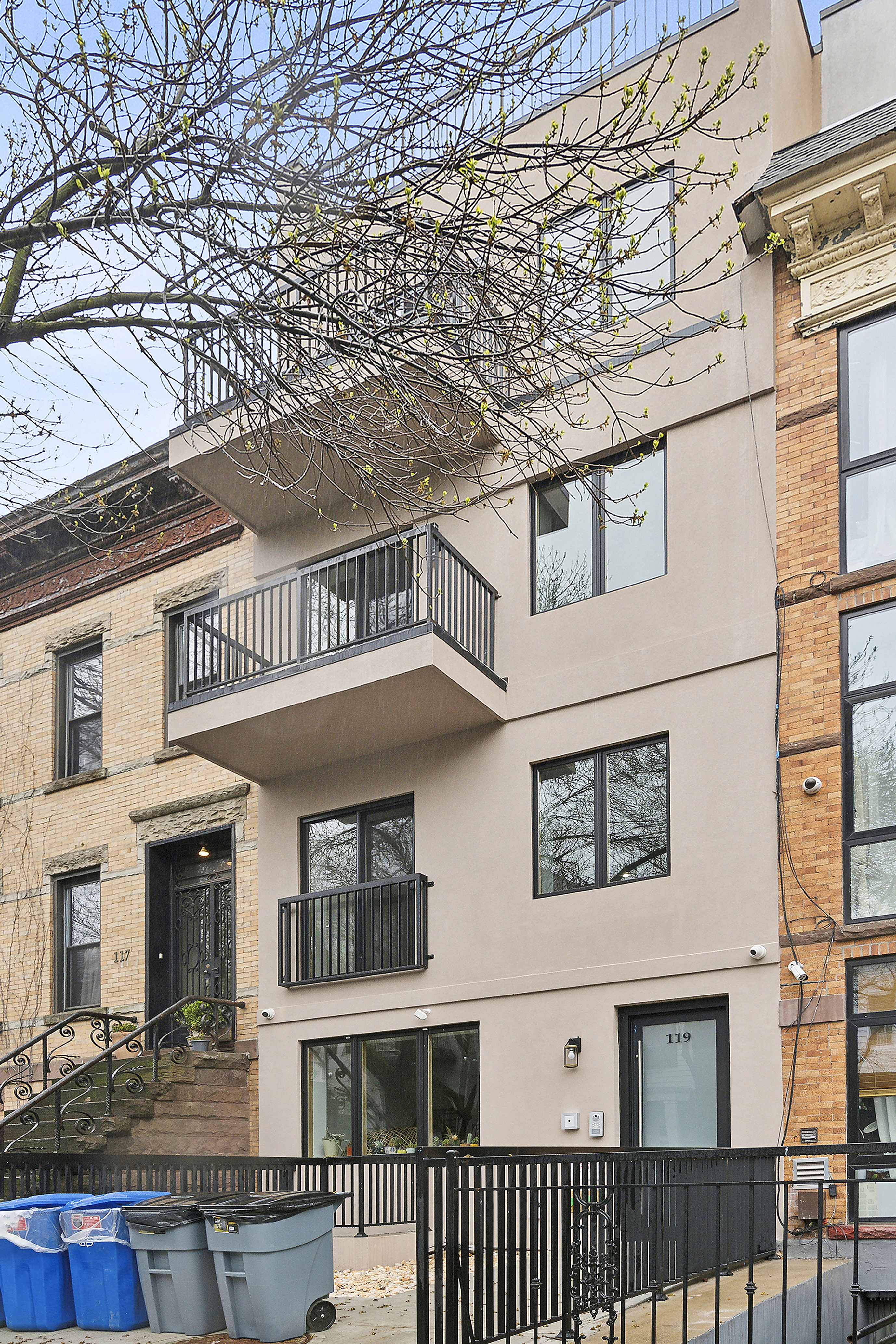 119 Woodbine Street, Unit 2 Brooklyn, NY 11221 - Photo 6 of 6 a front view of a house with balcony