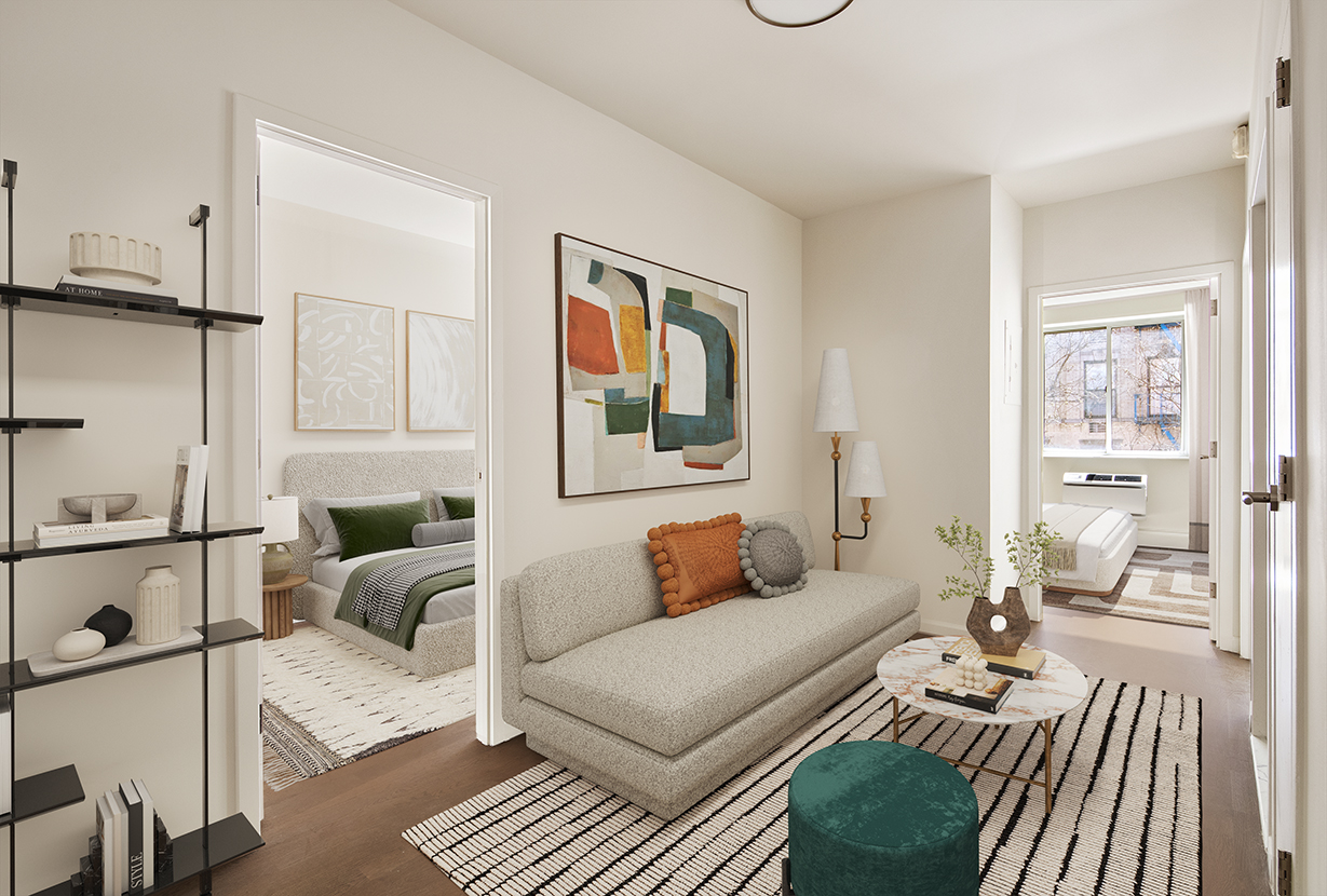 194 East 2nd Street, Unit 5B Manhattan, NY 10009 - Photo 1 of 15 a bedroom with furniture and a large window