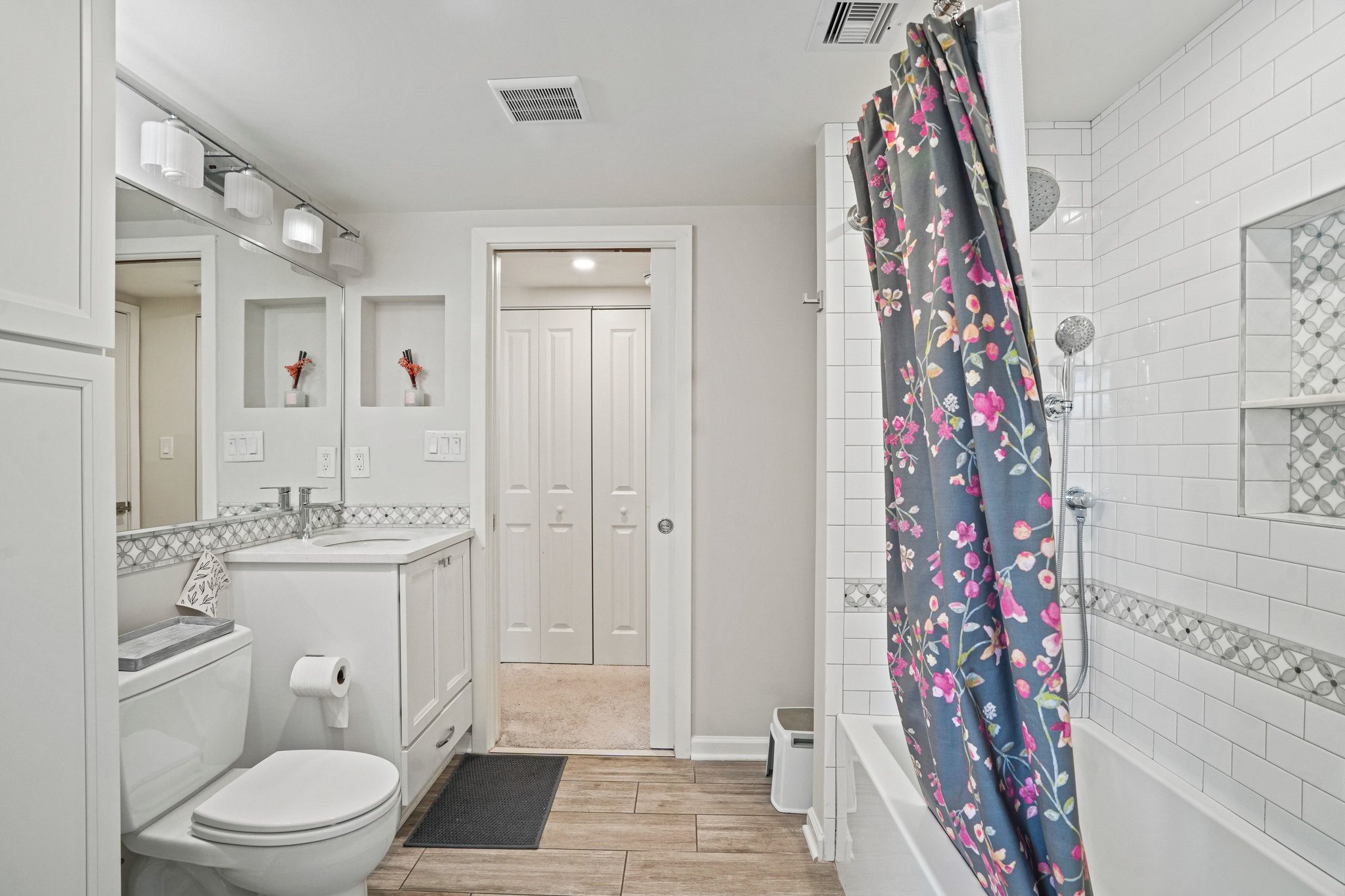 2725 Connecticut Avenue Northwest, Unit 507 Washington, DC 20008 - Photo 24 of 31 a bathroom with a toilet a sink and a shower