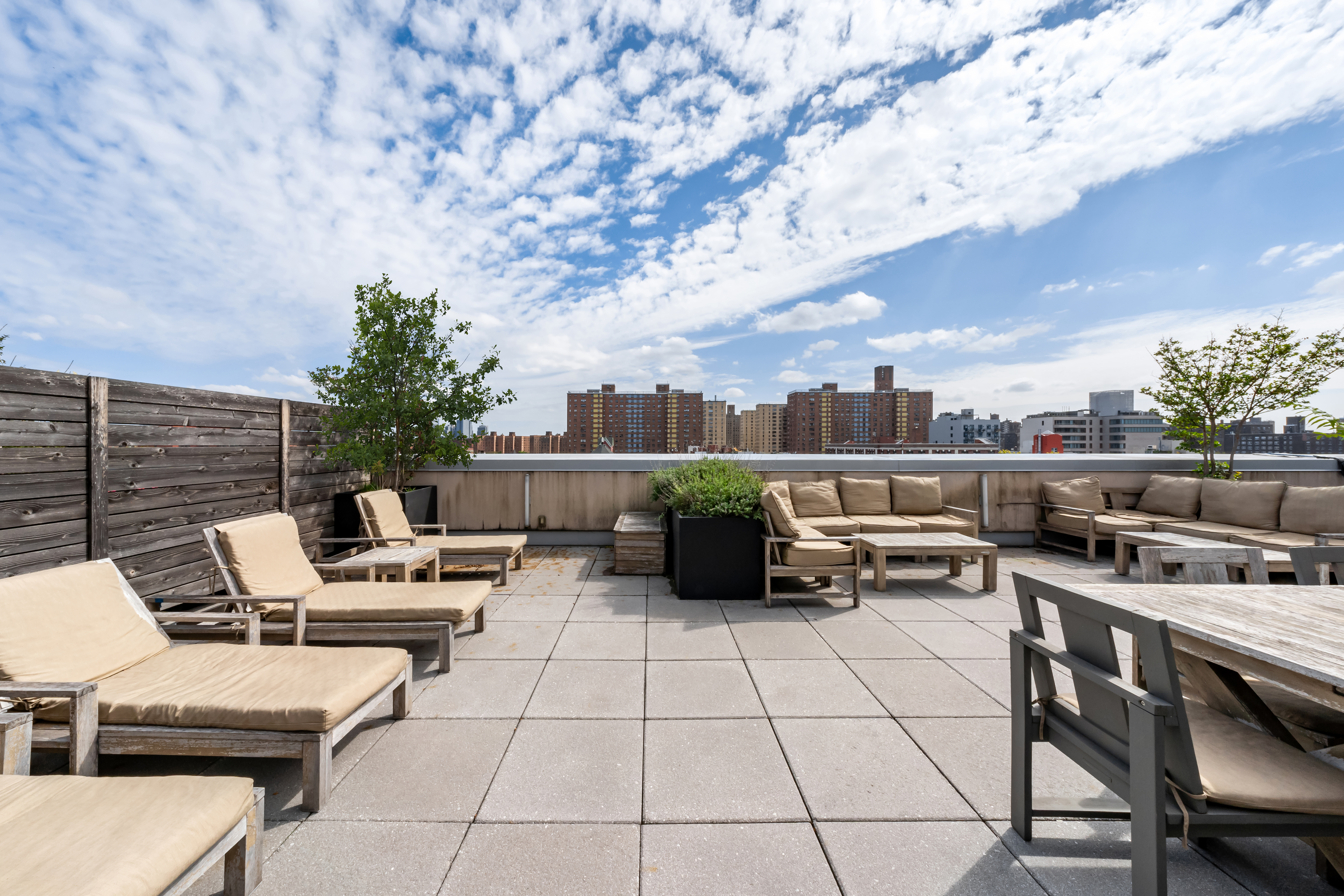 50 Clinton Street, Unit 4A Manhattan, NY 10002 - Photo 10 of 12 a terrace with outdoor seating and city view