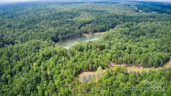 a view of a lake with a park
