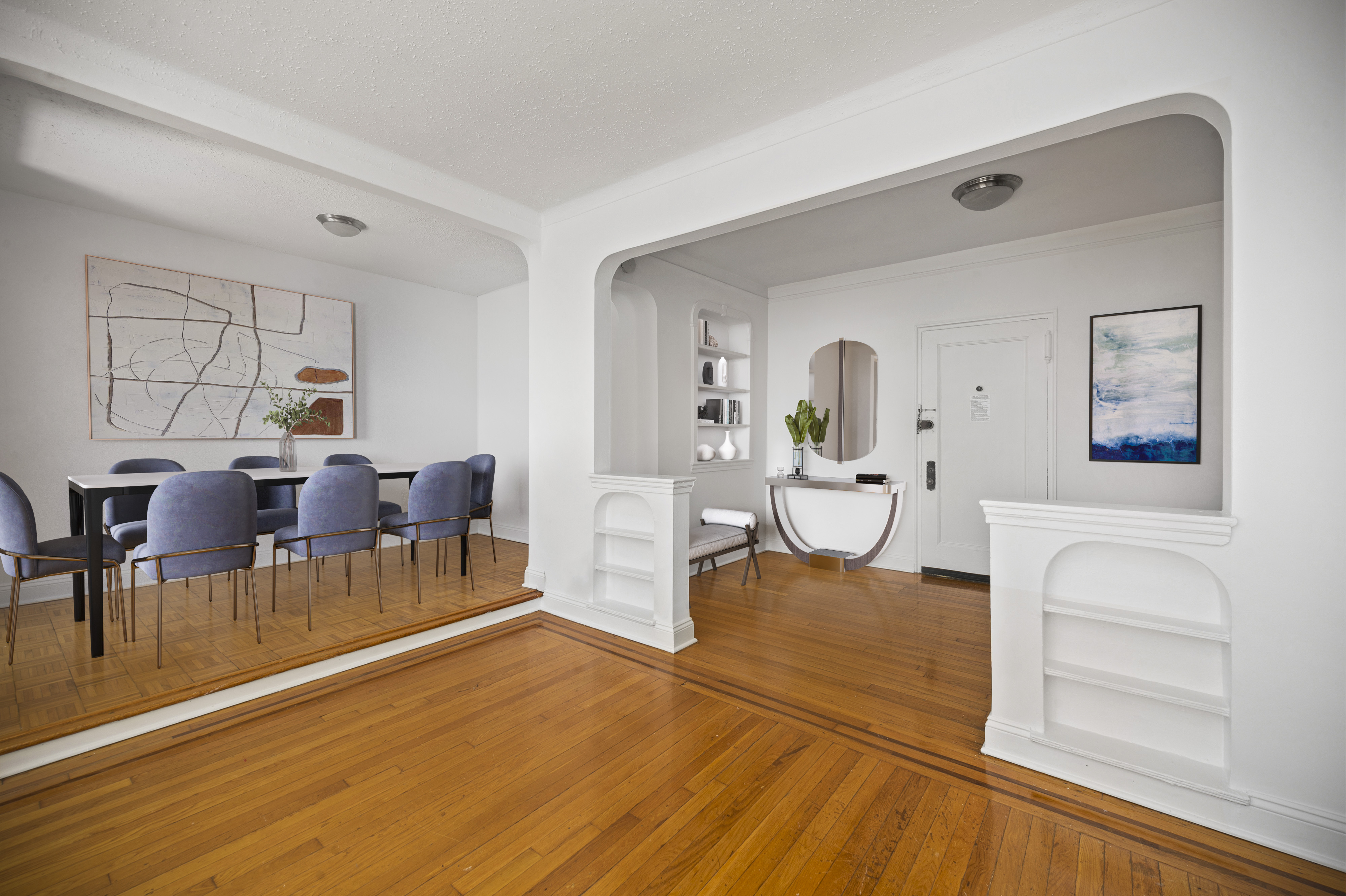 105-05 69th Avenue, Unit 301 Queens, NY 11375 - Photo 3 of 13 a living room with furniture and a wooden floor