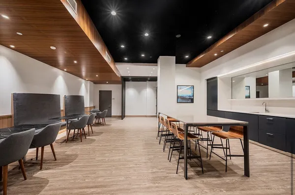 a view of a dining room with furniture