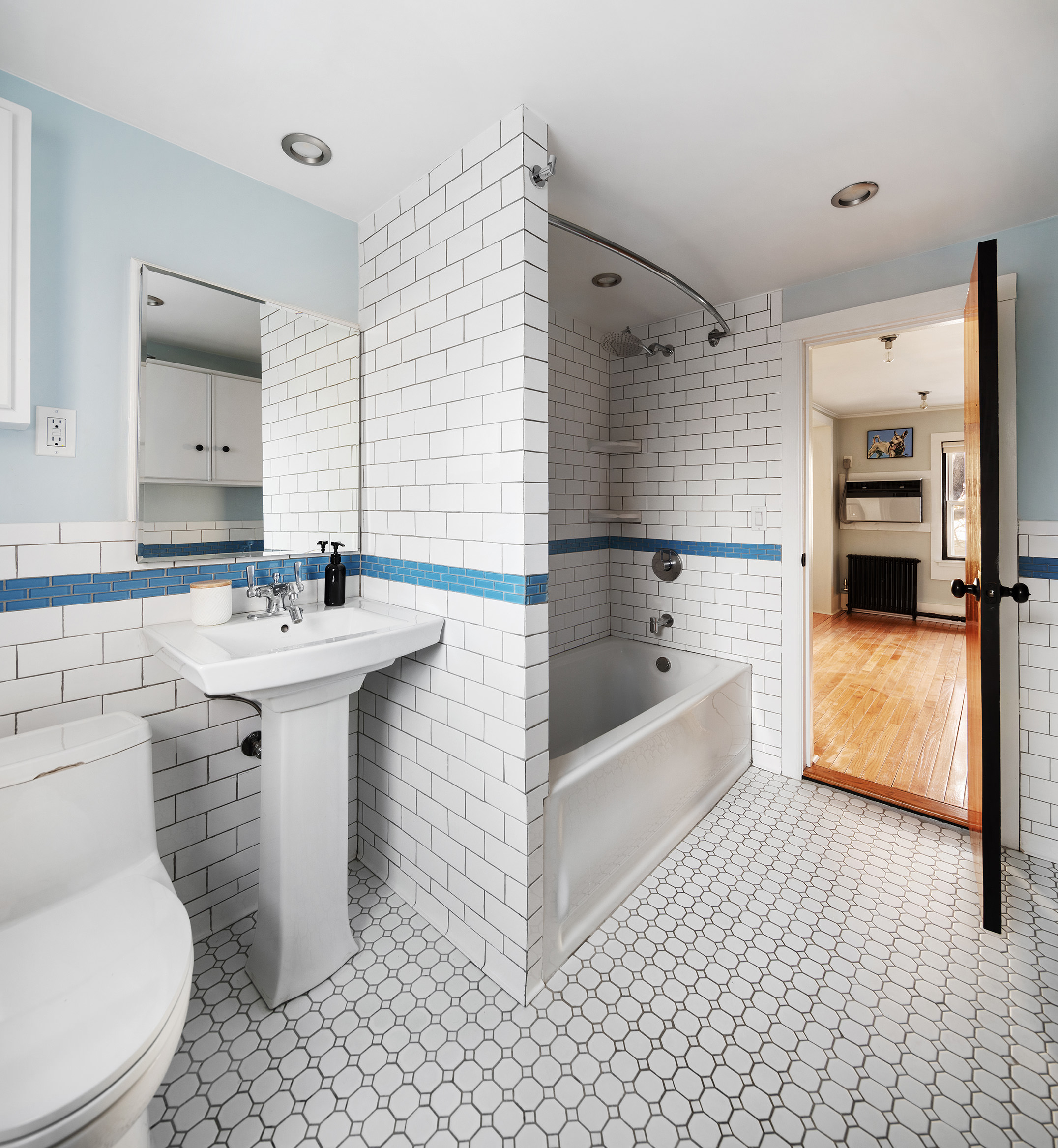 214 Withers Street Brooklyn, NY 11211 - Photo 6 of 10 a bathroom with a sink toilet and shower