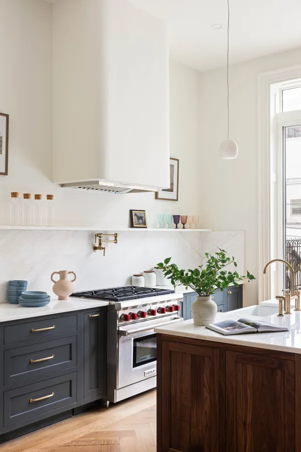 a kitchen with sink and cabinets