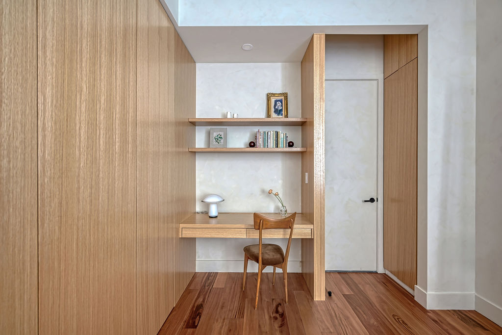 42 East 12th Street, Unit 2 Manhattan, NY 10003 - Photo 7 of 18 a view of a hallway with wooden floor and a cabinet