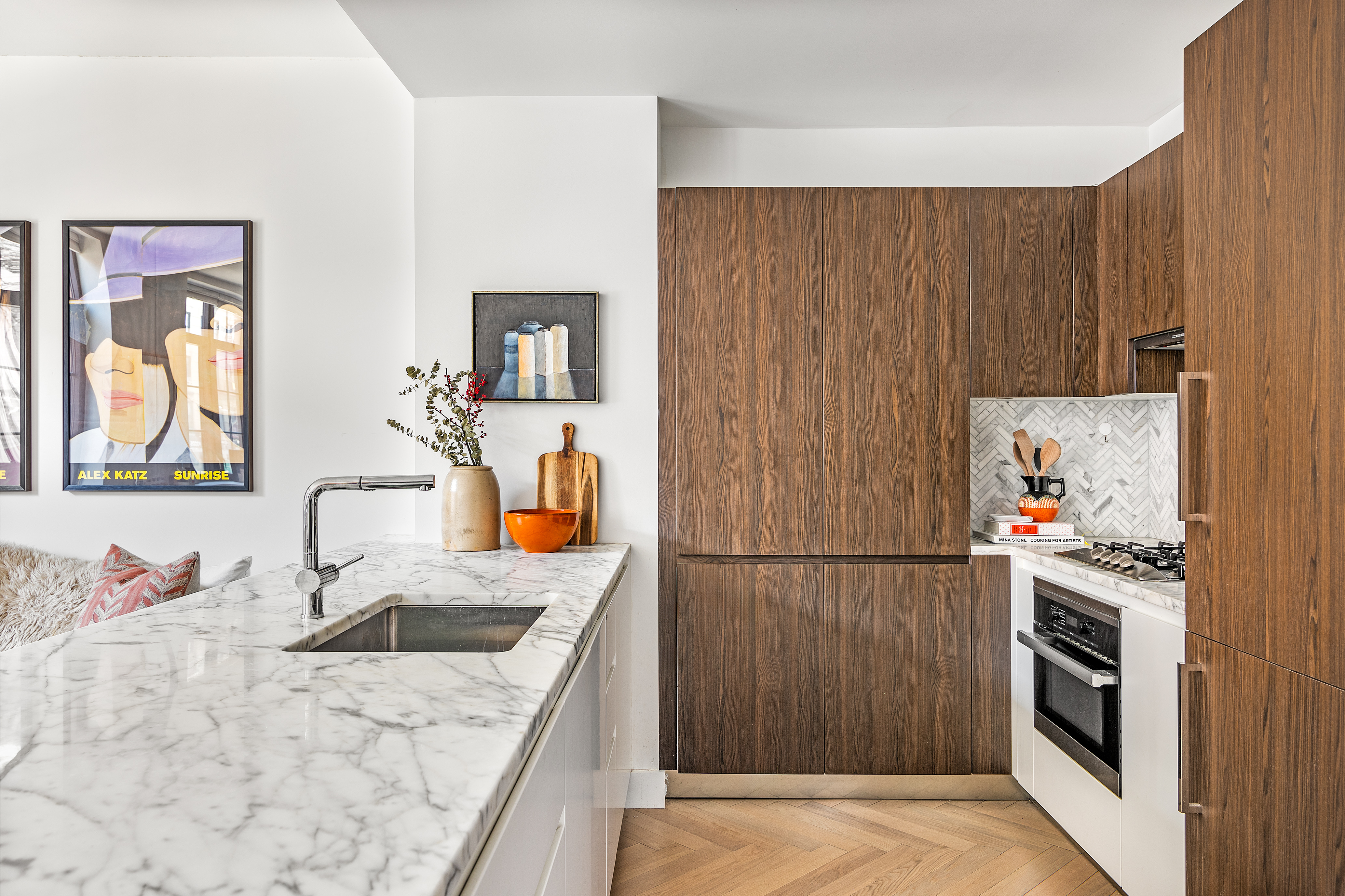 100 Avenue A, Unit 2B Manhattan, NY 10009 - Photo 5 of 11 a kitchen with stainless steel appliances granite countertop a sink stove and refrigerator