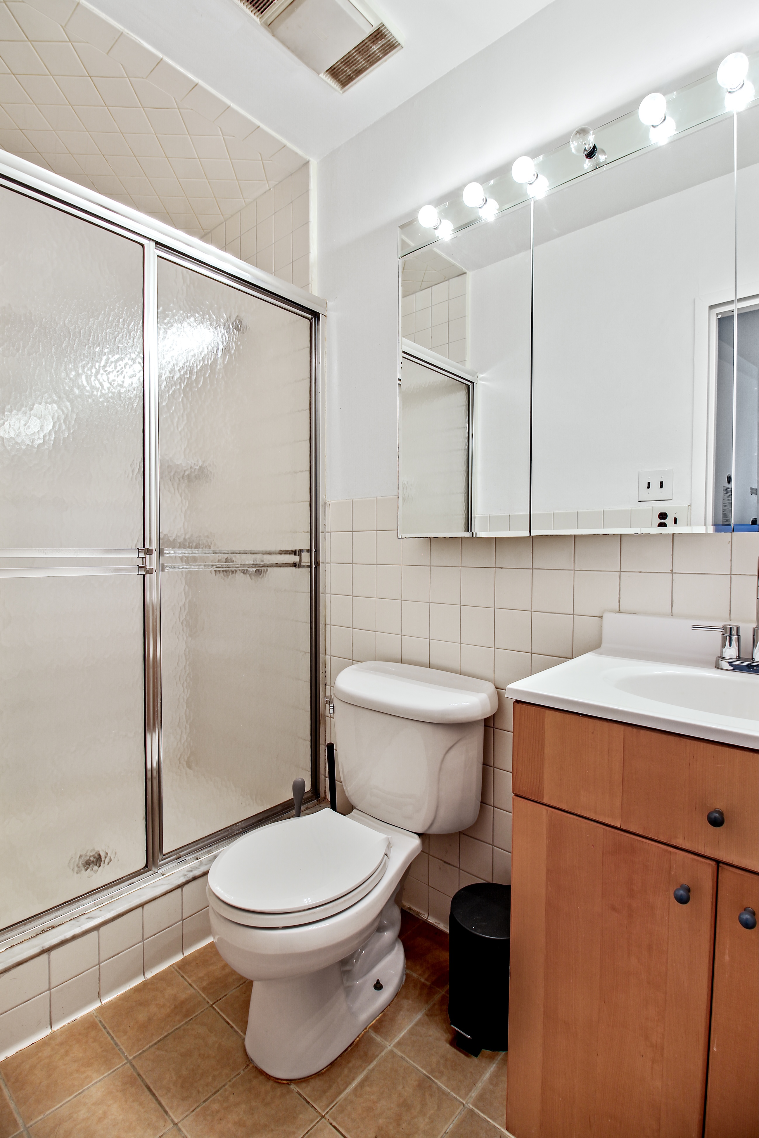 621 2nd Avenue, Unit 2 Manhattan, NY 10016 - Photo 8 of 8 a bathroom with a toilet a sink and a shower