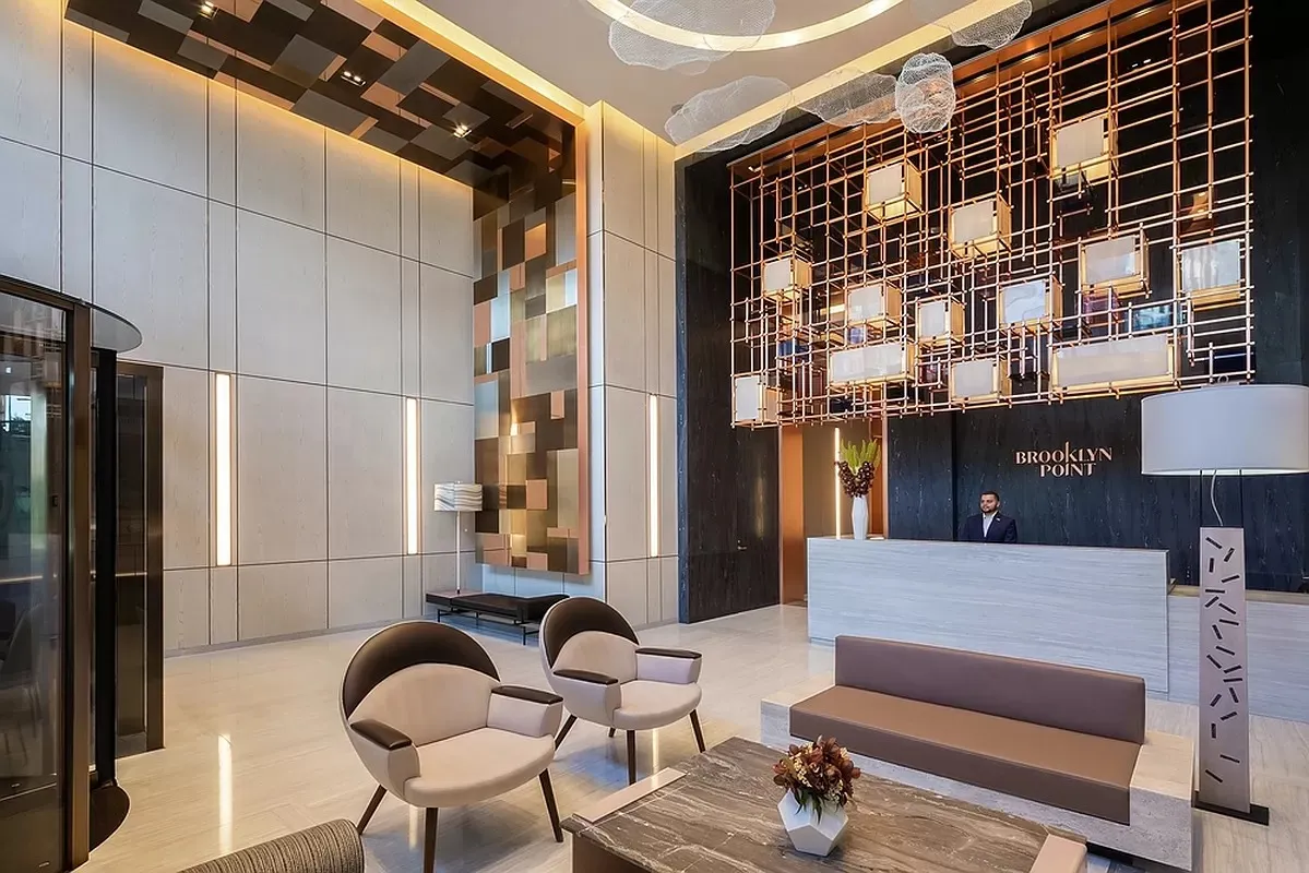 a view of living room kitchen and dining room