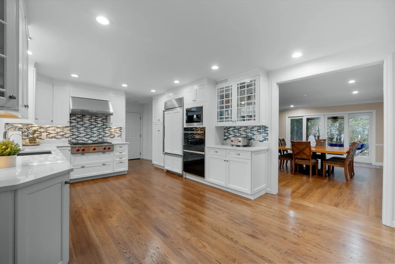 a view of kitchen with microwave and cabinets
