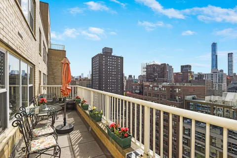 a view of city from a balcony