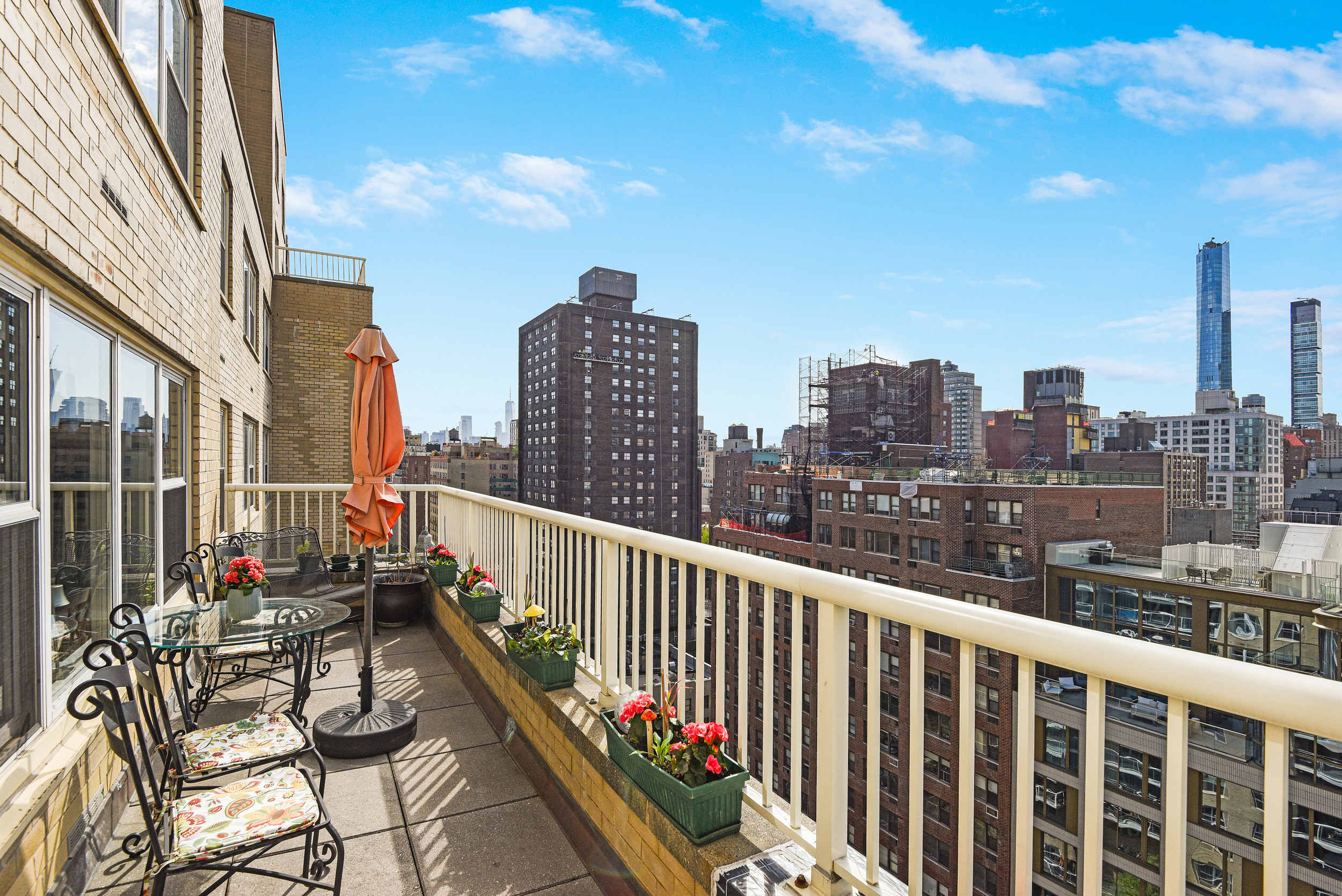 305 East 24th Street, Unit 18C Manhattan, NY 10010 - Photo 4 of 13 a view of city from a balcony