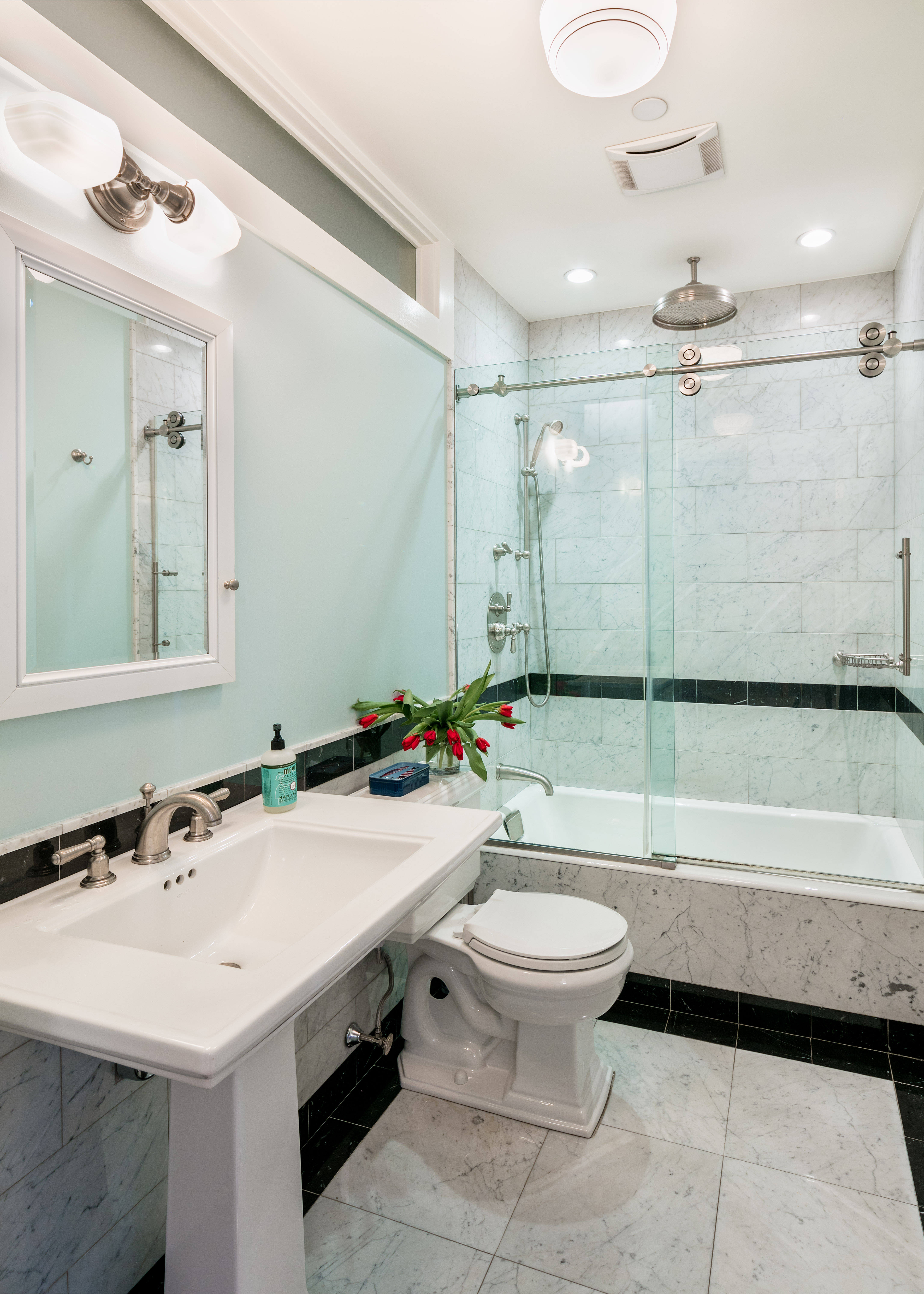 6 Varick Street, Unit 2A Manhattan, NY 10013 - Photo 5 of 6 a bathroom with a sink toilet and shower