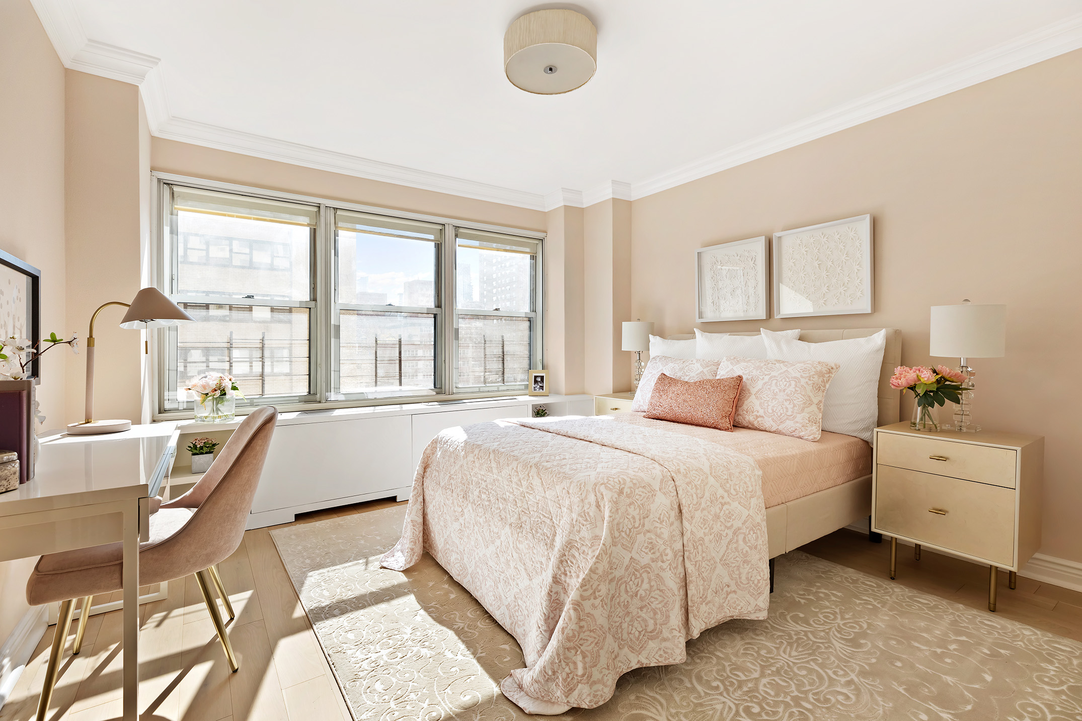155 East 38th Street, Unit 12K Manhattan, NY 10016 - Photo 10 of 15 a spacious bedroom with a bed and a large window