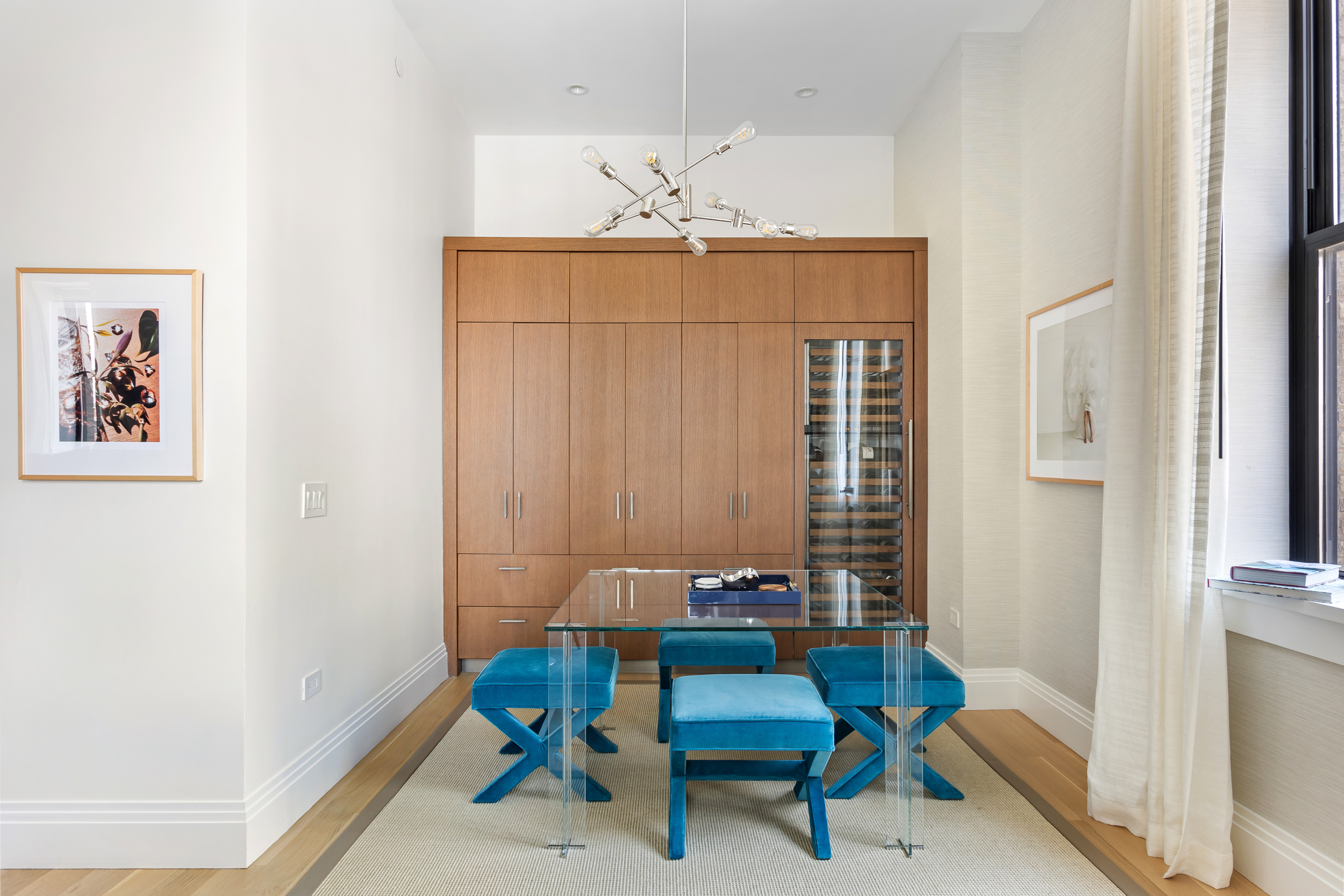 100 Barclay Street, Unit 17A Manhattan, NY 10007 - Photo 5 of 24 a view of a livingroom with furniture and a window