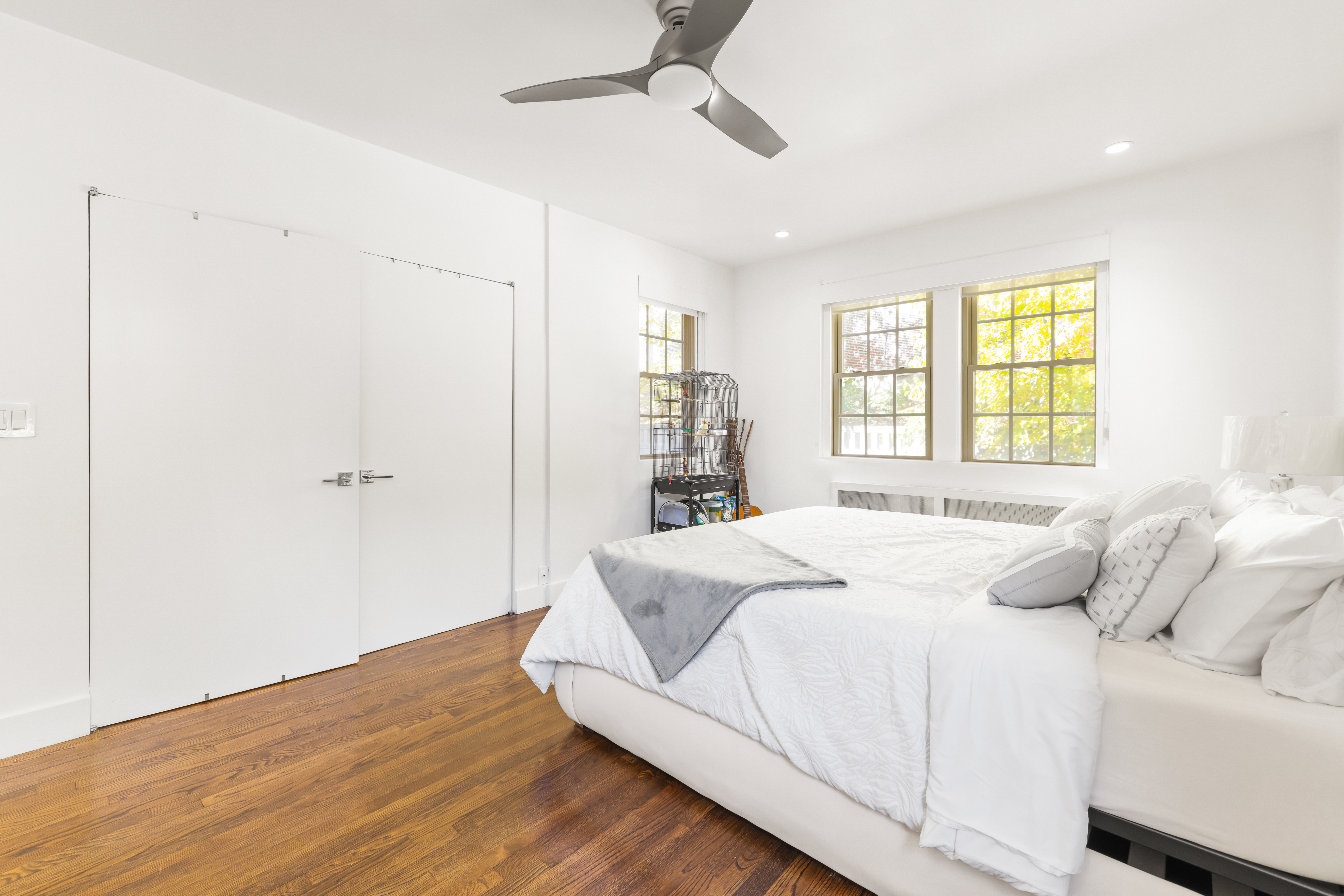 1490 Beacon Street, Unit 4 Brookline, MA 02446 - Photo 17 of 20 a bedroom with a bed and a window