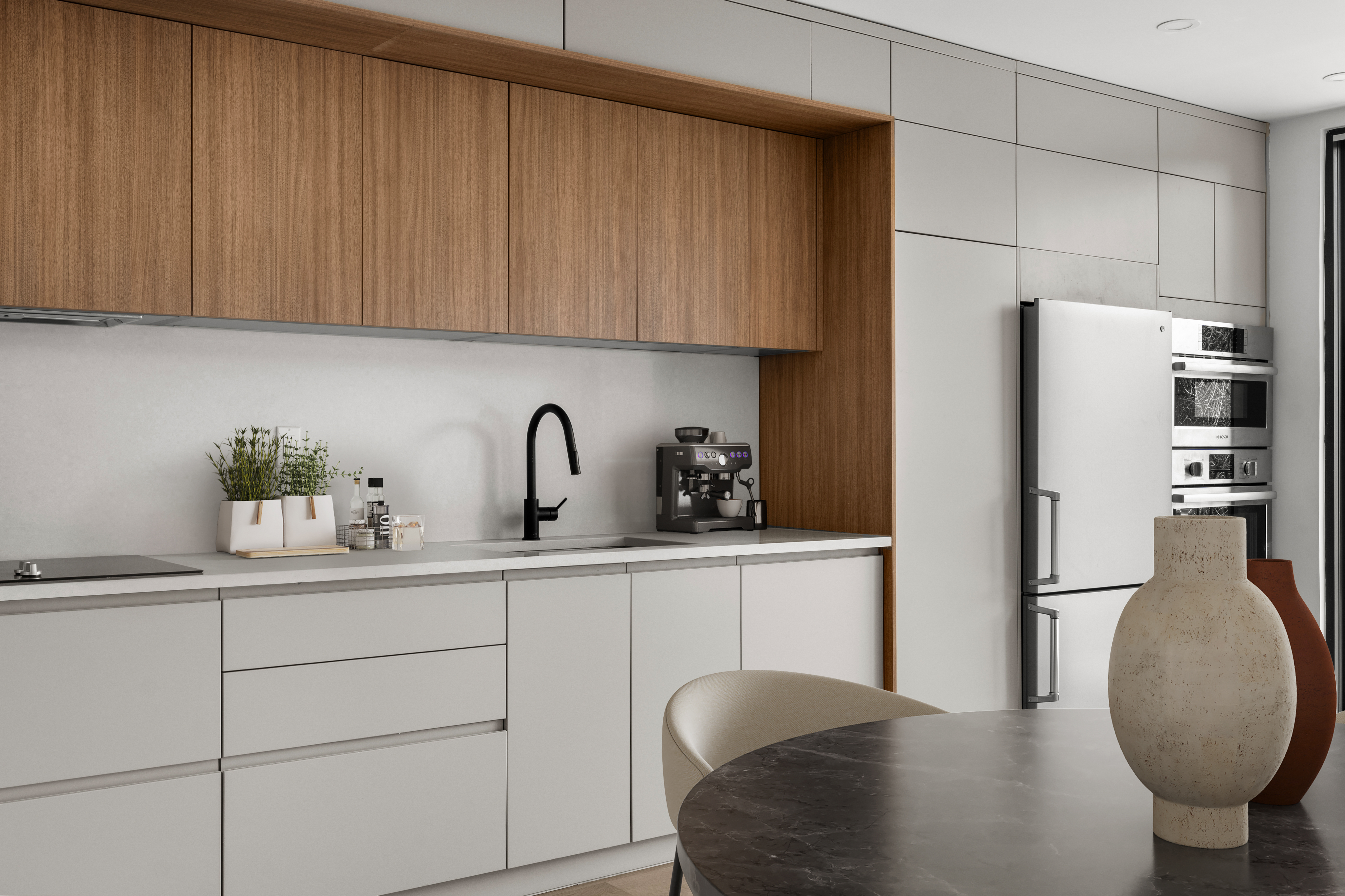 14-35 Broadway, Unit 1A Queens, NY 11106 - Photo 5 of 20 a kitchen with stainless steel appliances a refrigerator sink and cabinets