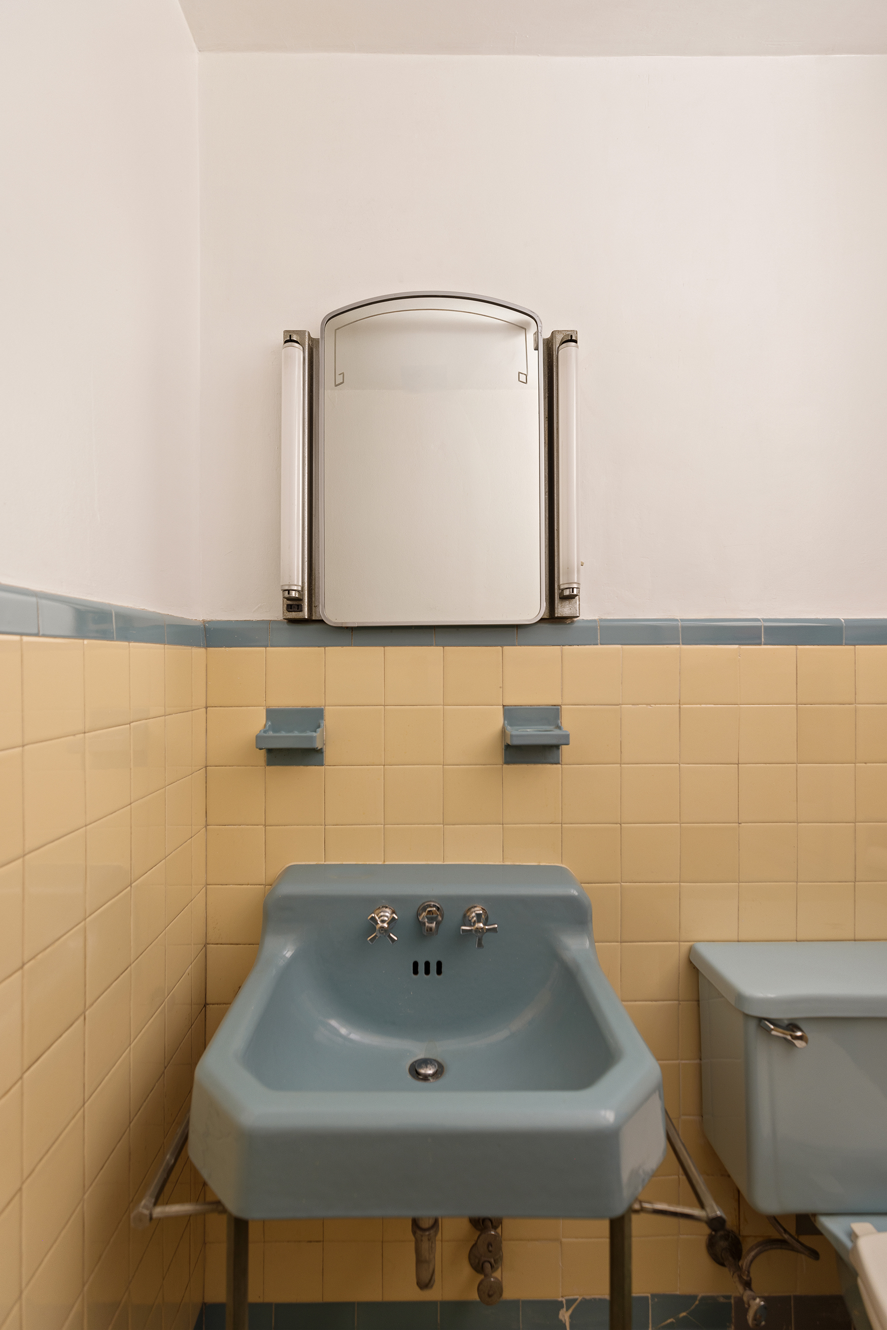 116 Brooklyn Avenue Brooklyn, NY 11216 - Photo 19 of 21 a bathroom with a sink and a toilet