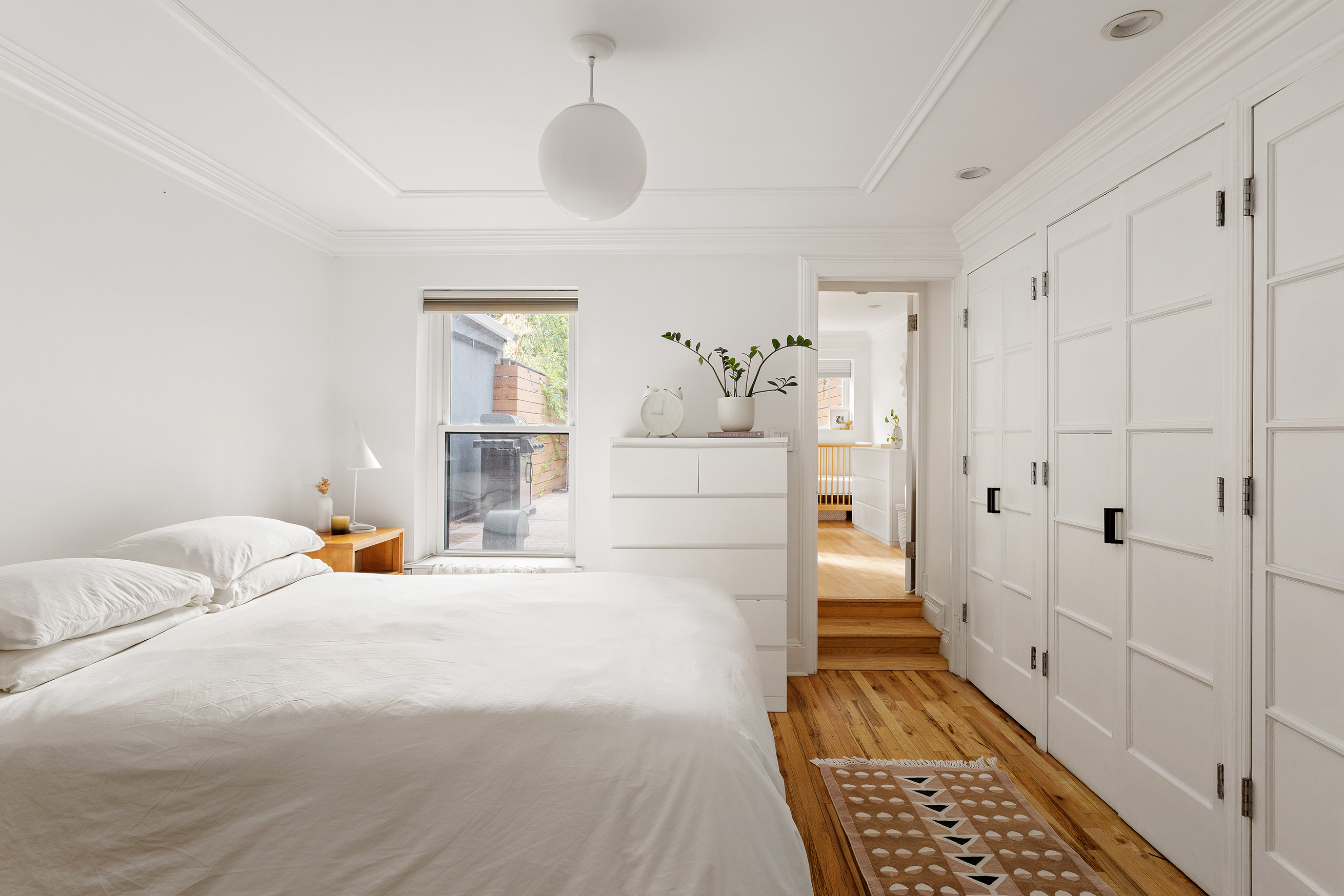 659 Degraw Street, Unit 1 Brooklyn, NY 11217 - Photo 5 of 10 a bedroom with a bed and a window