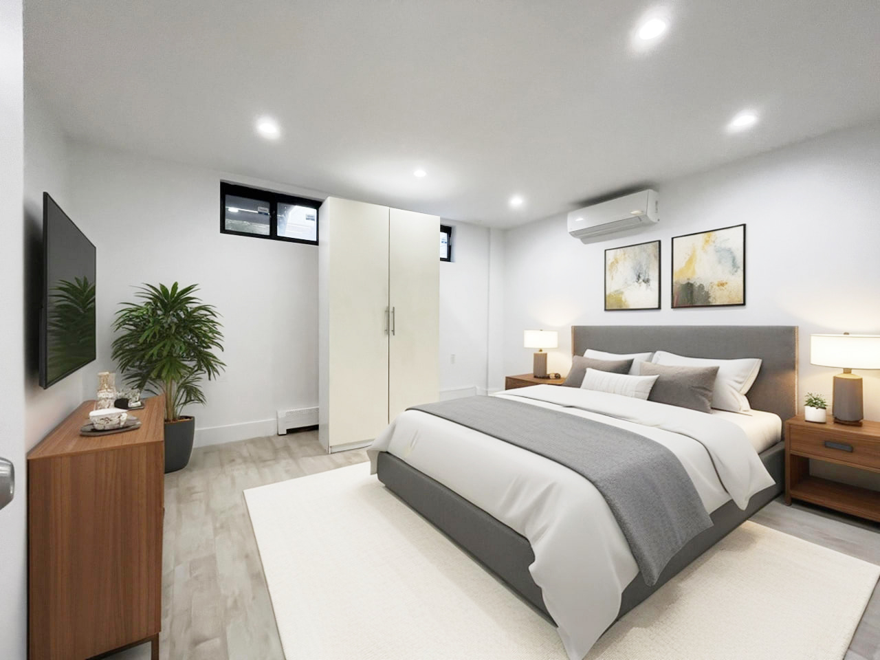 157 Prospect Avenue, Unit 1 Brooklyn, NY 11215 - Photo 5 of 10 a bedroom with a large bed and a potted plant