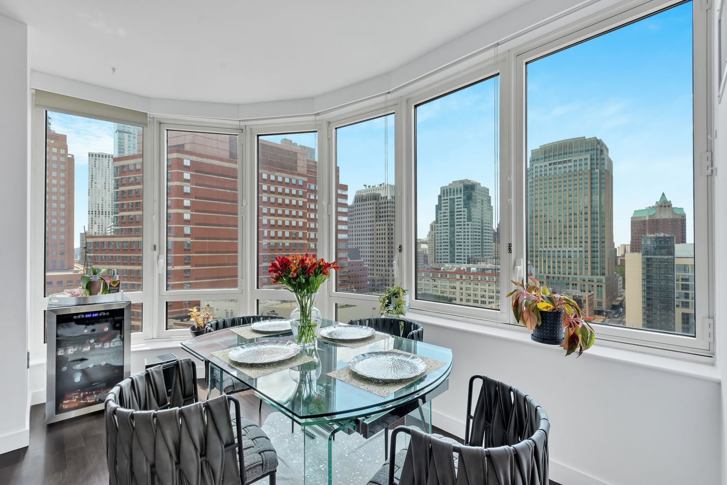 306 Gold Street, Unit 20F Brooklyn, NY 11201 - Photo 2 of 21 a living room with furniture and floor to ceiling windows