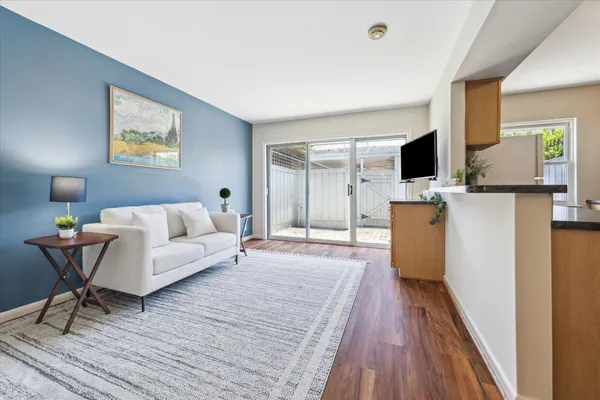 a living room with furniture and a table