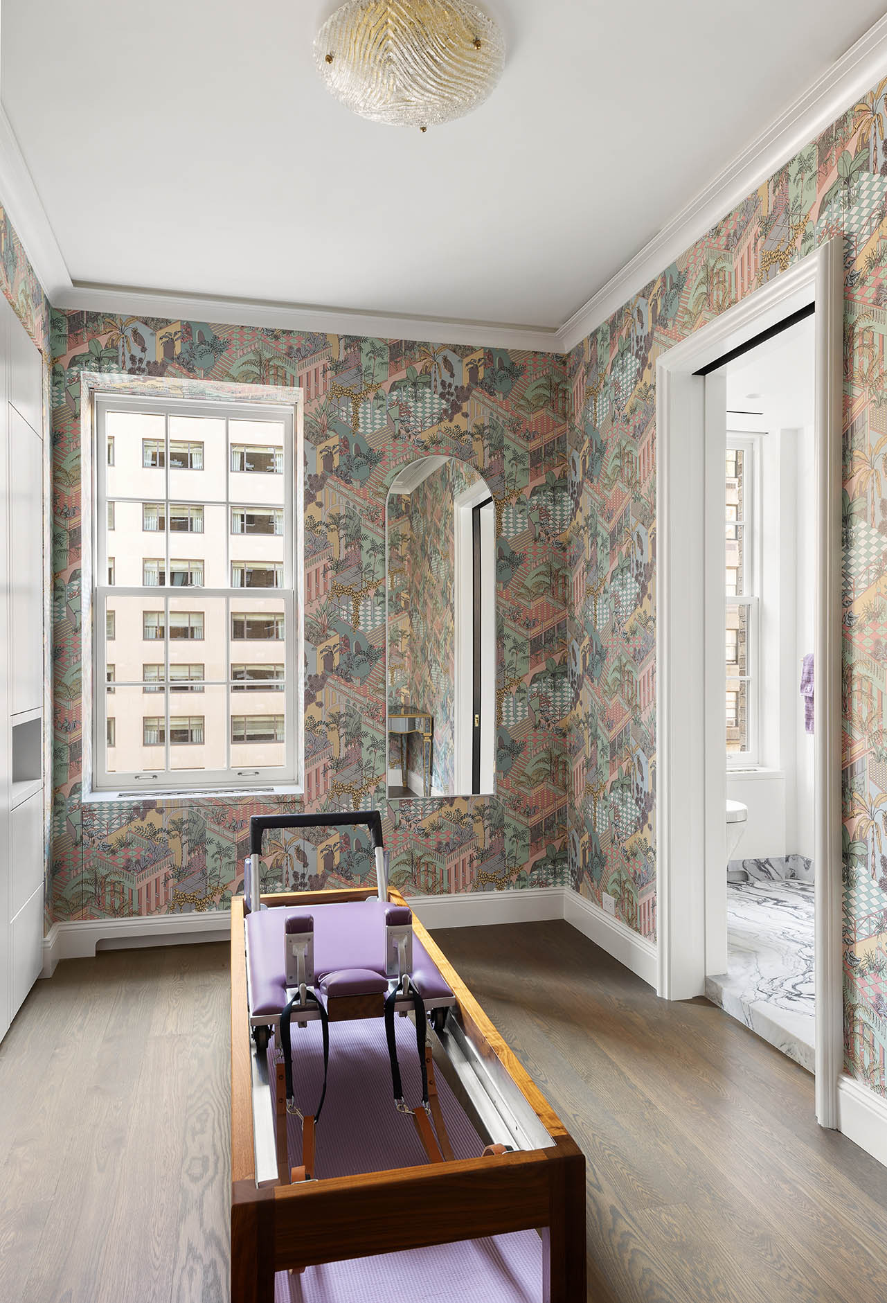 535 Park Avenue, Unit 8AB Manhattan, NY 10065 - Photo 15 of 20 a living room with furniture and large windows
