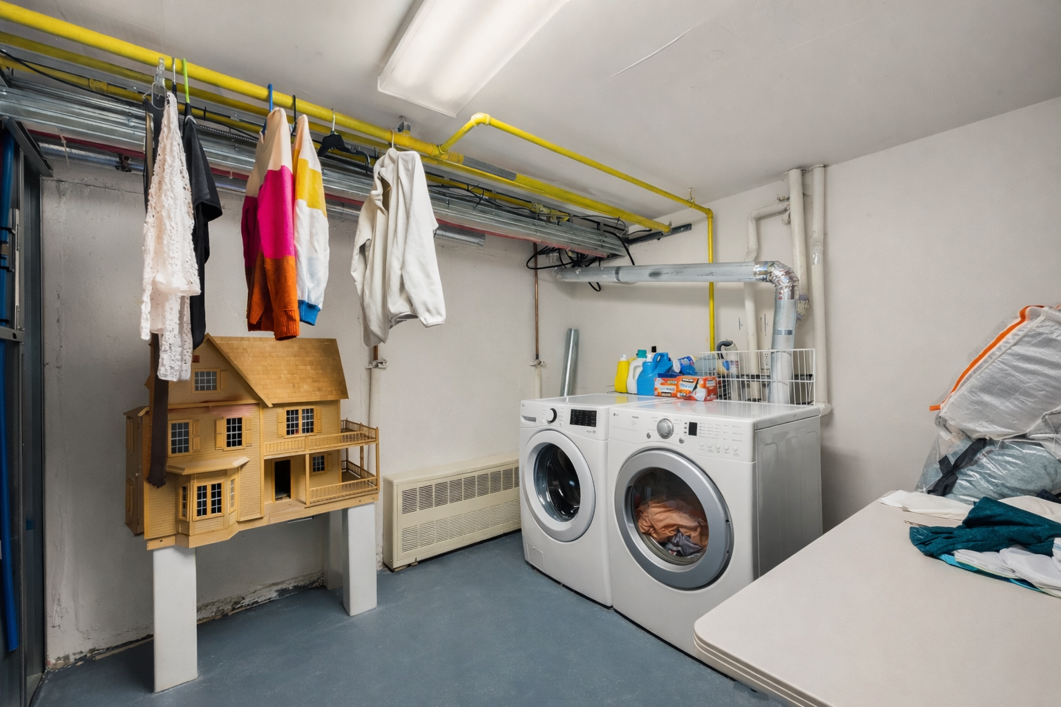 415 East 160th Street, Unit 1 Bronx, NY 10451 - Photo 14 of 16 a utility room with dryer and washer