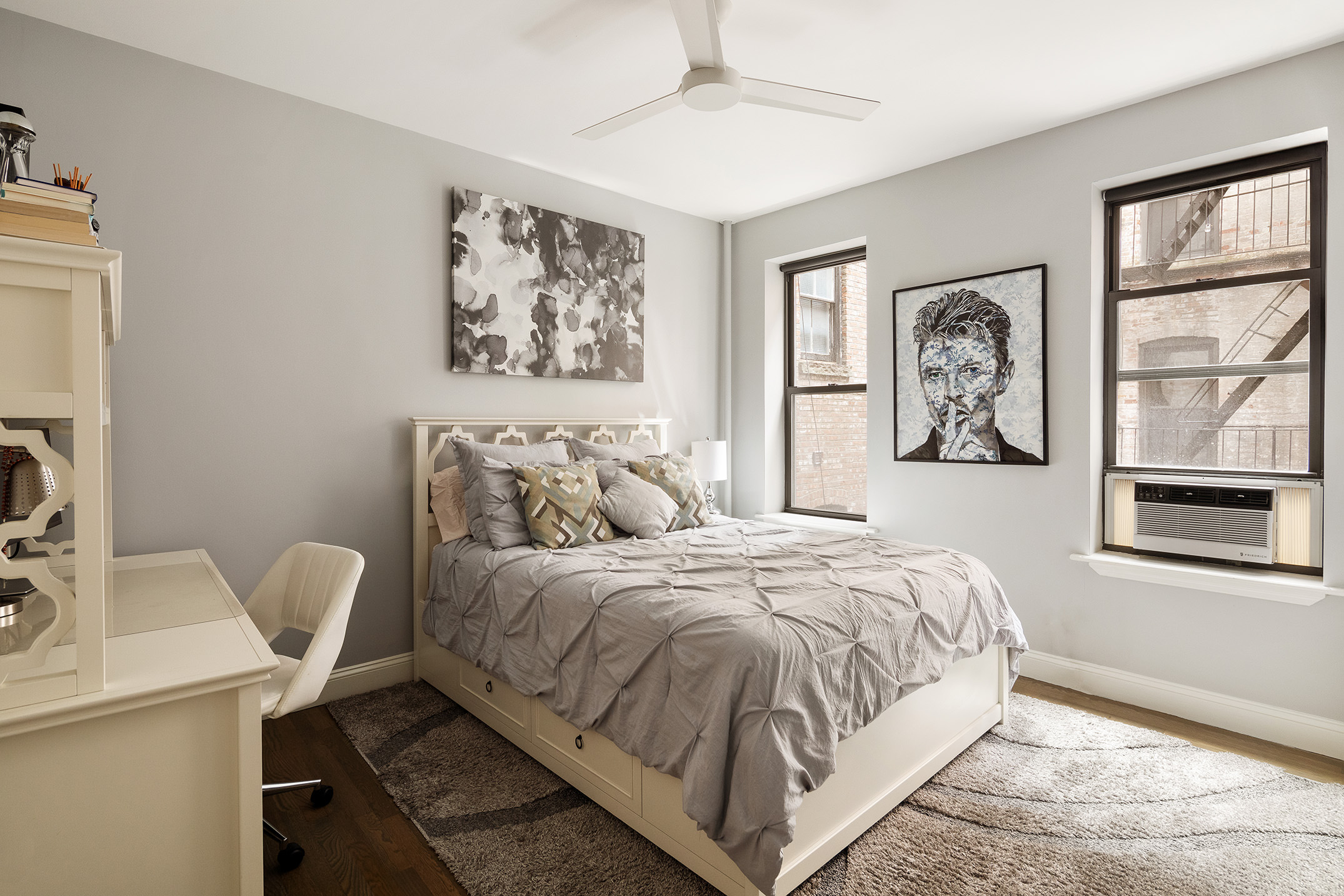 270 West 11th Street, Unit 3D Manhattan, NY 10014 - Photo 4 of 9 a bedroom with a bed and a painting on the wall