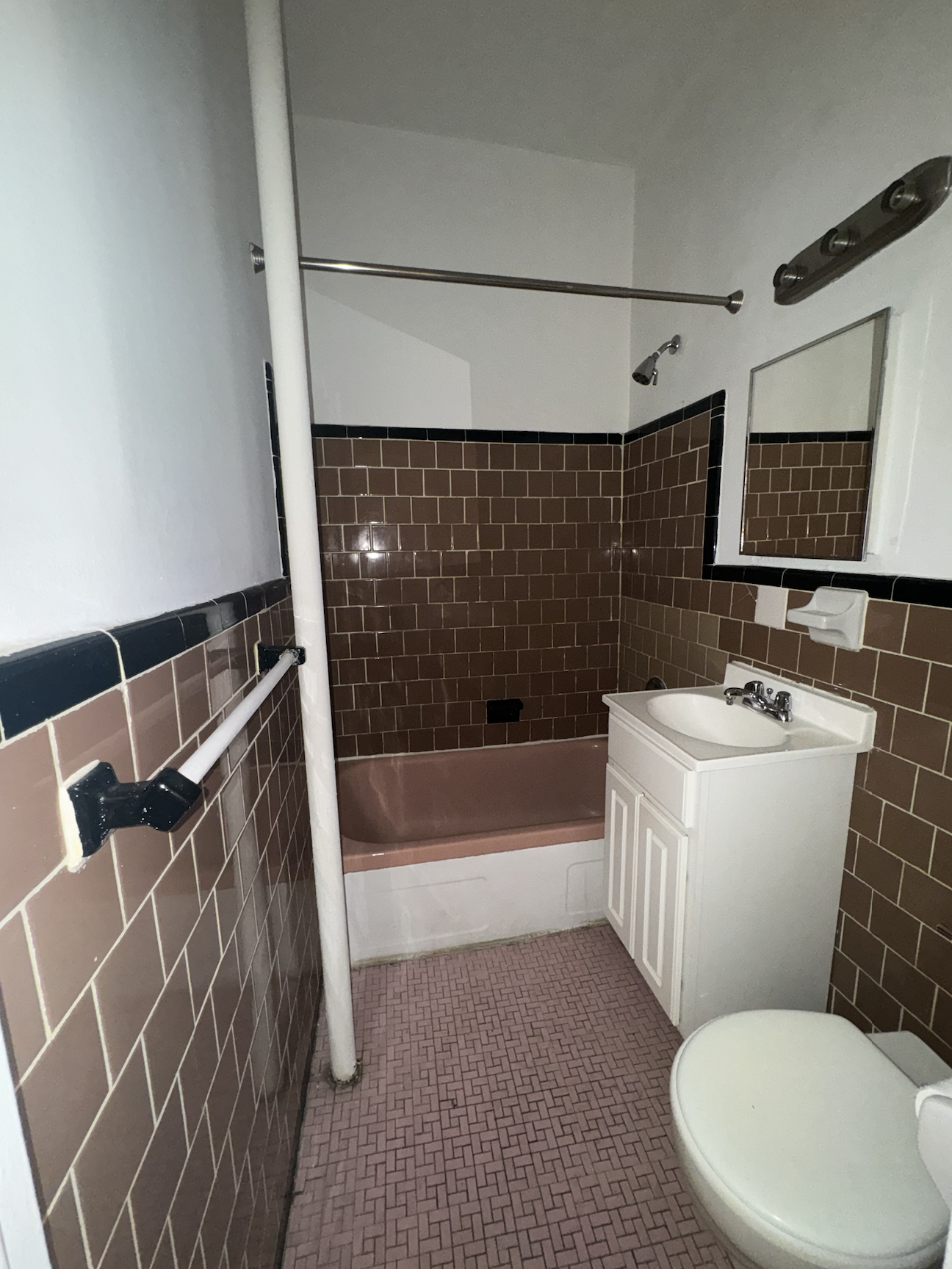 445 West 48th Street, Unit 2D Manhattan, NY 10036 - Photo 9 of 18 a bathroom with a sink toilet and shower