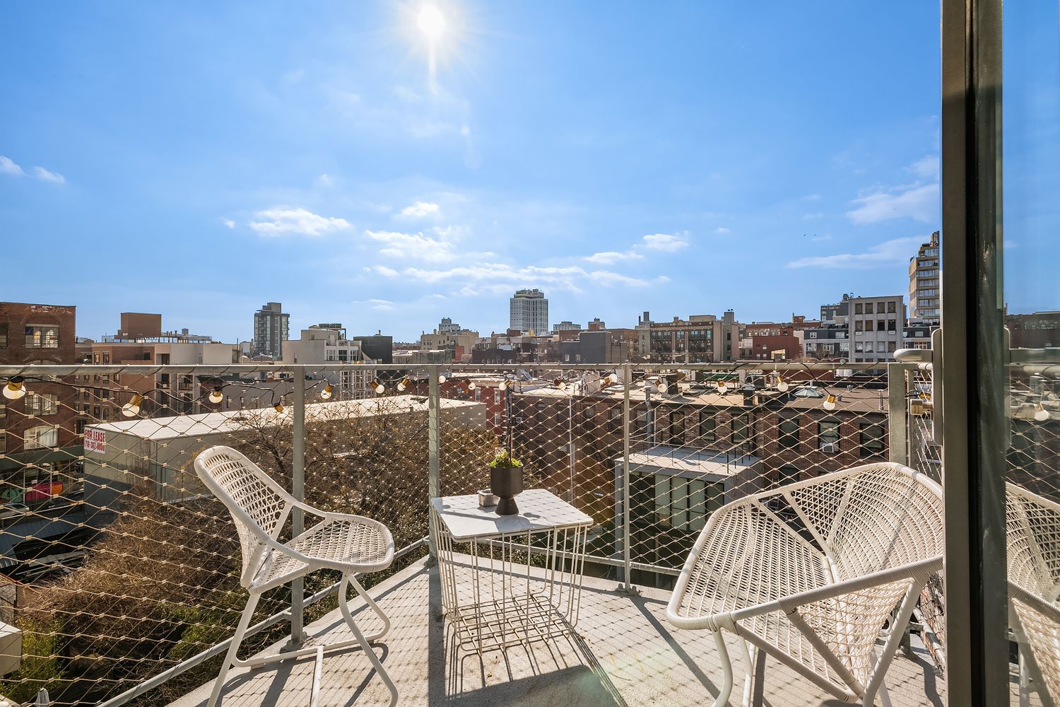280 Metropolitan Avenue, Unit 5D Brooklyn, NY 11211 - Photo 16 of 22 a view of a balcony with an ocean view