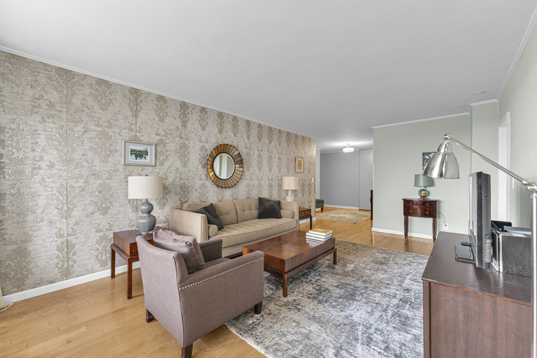 5800 Arlington Avenue, Unit 6V Bronx, NY 10471 - Photo 4 of 15 a living room with furniture and a table