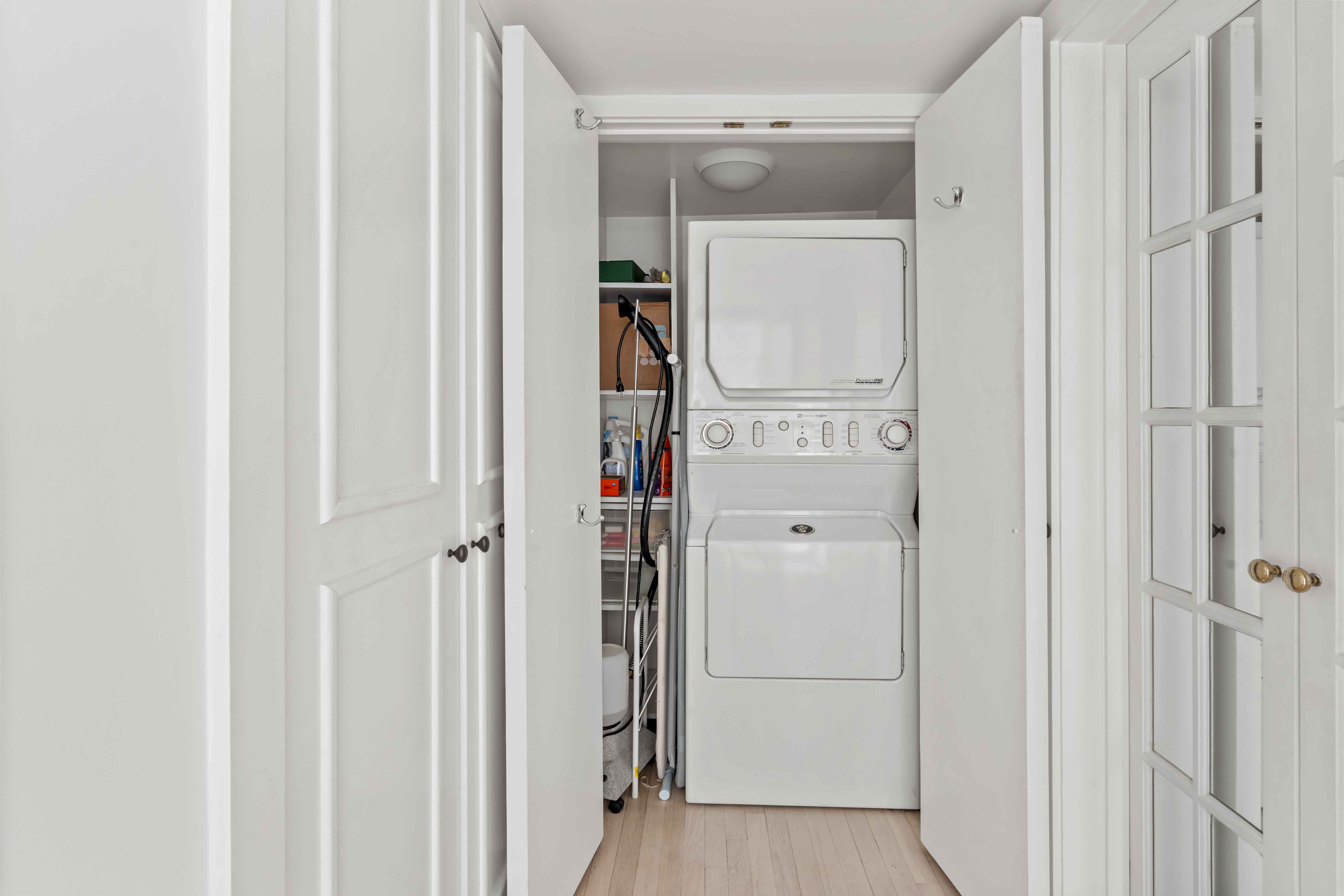 240 Centre Street, Unit 2N Manhattan, NY 10013 - Photo 8 of 16 a view of a hallway with closet area