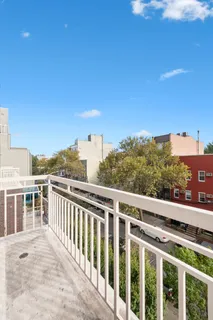 a view of a building from a balcony