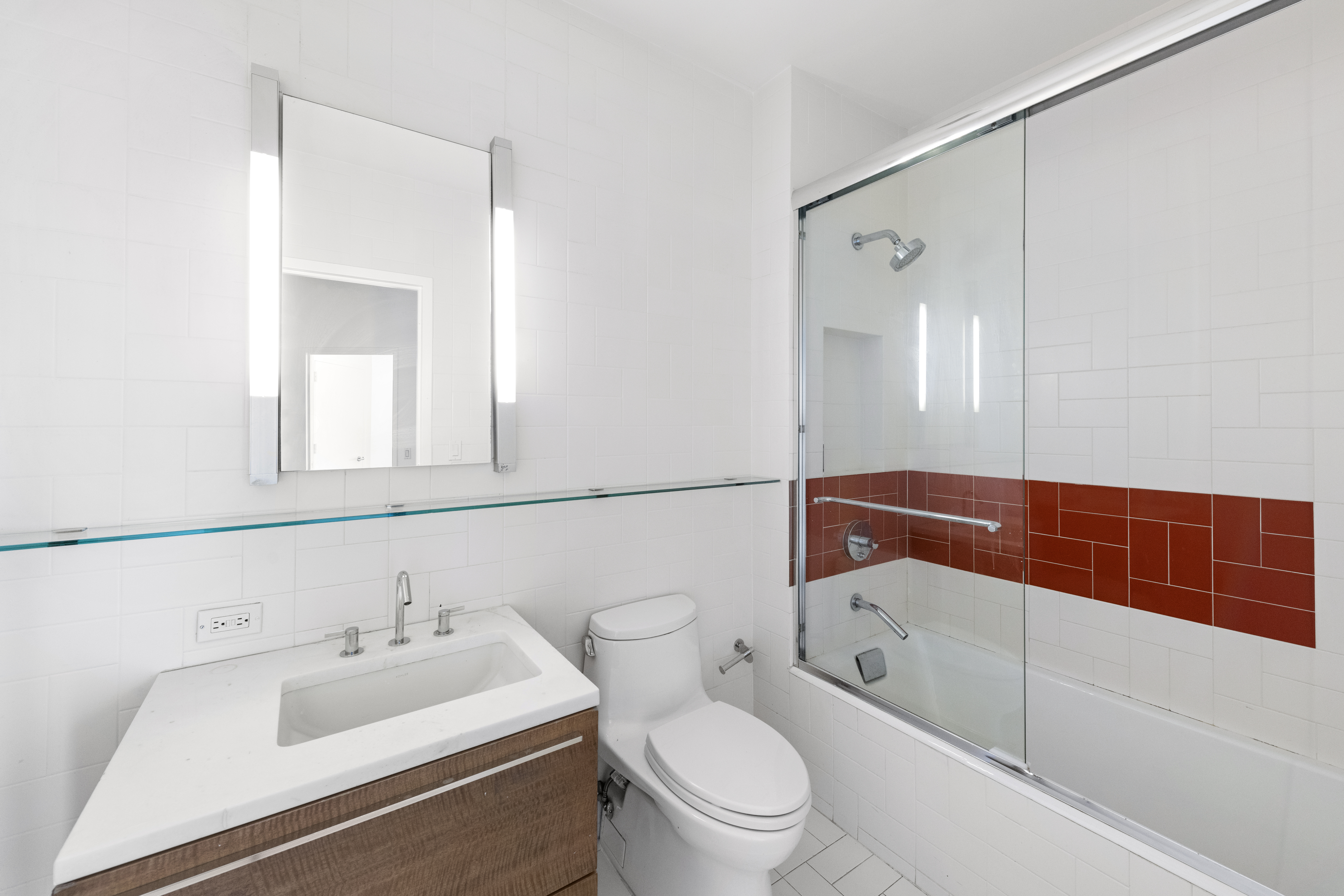 475 Greenwich Street, Unit PHN Manhattan, NY 10013 - Photo 18 of 28 a bathroom with a sink a toilet and shower