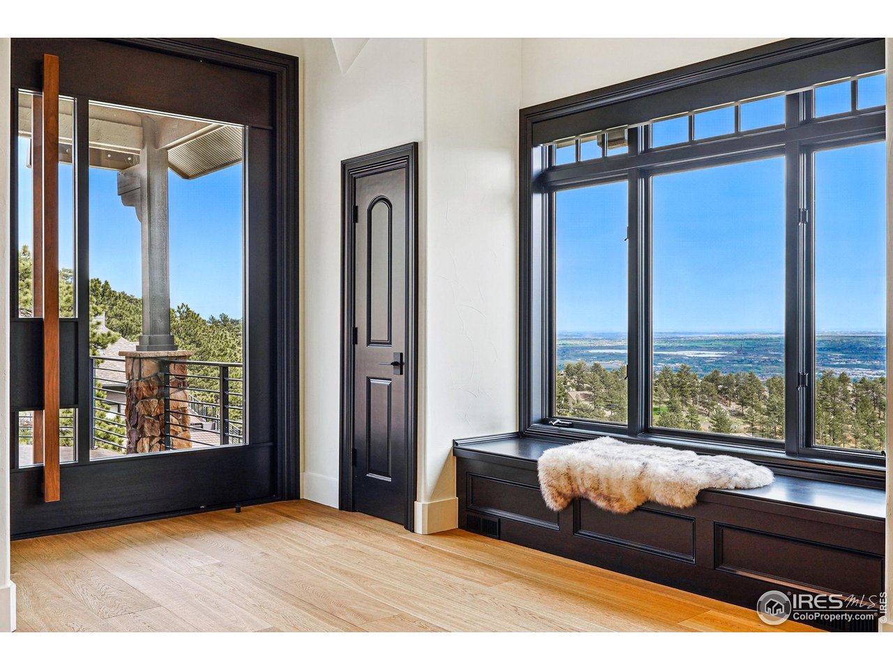 166 Valley View Way Boulder, CO 80304 - Photo 5 of 40 a bedroom with furniture and large window