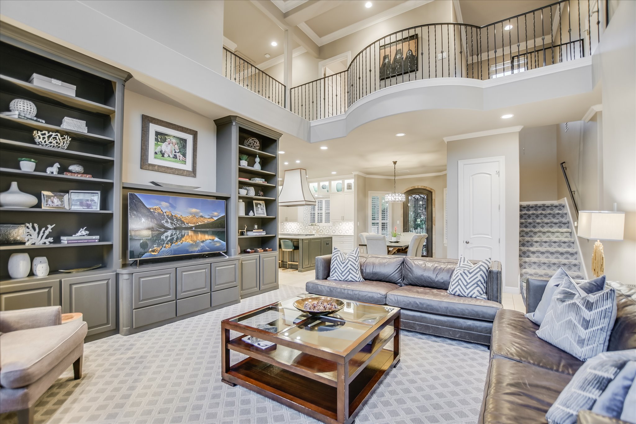 1422 Palomino Ridge Drive Austin, TX 78733 - Photo 16 of 60 a living room with furniture and a dining table