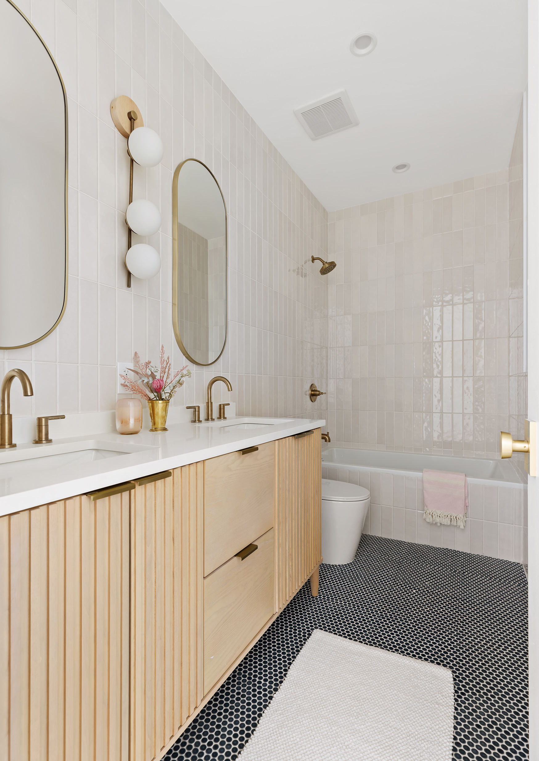 1433 Dean Street Brooklyn, NY 11213 - Photo 13 of 18 a bathroom with a double vanity sink and a mirror