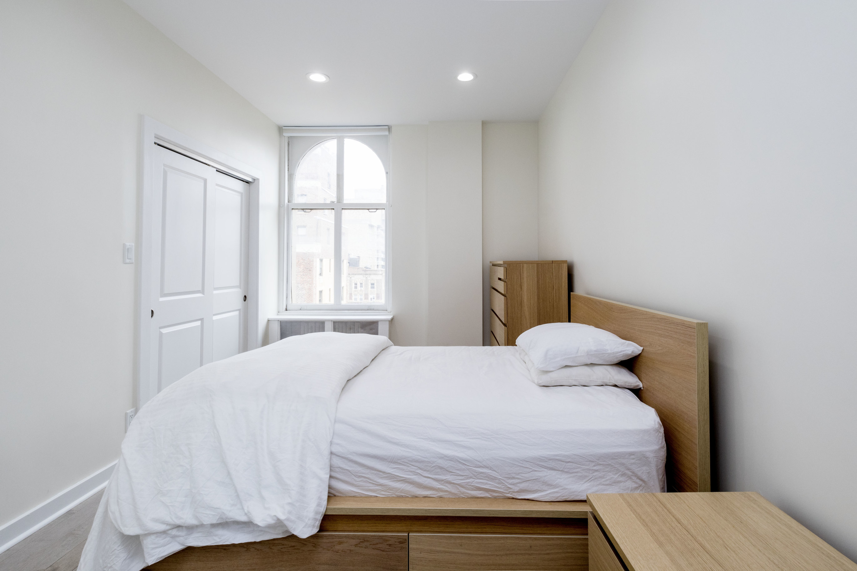 390 West End Avenue, Unit PHK Manhattan, NY 10024 - Photo 12 of 27 a bedroom with a bed and window