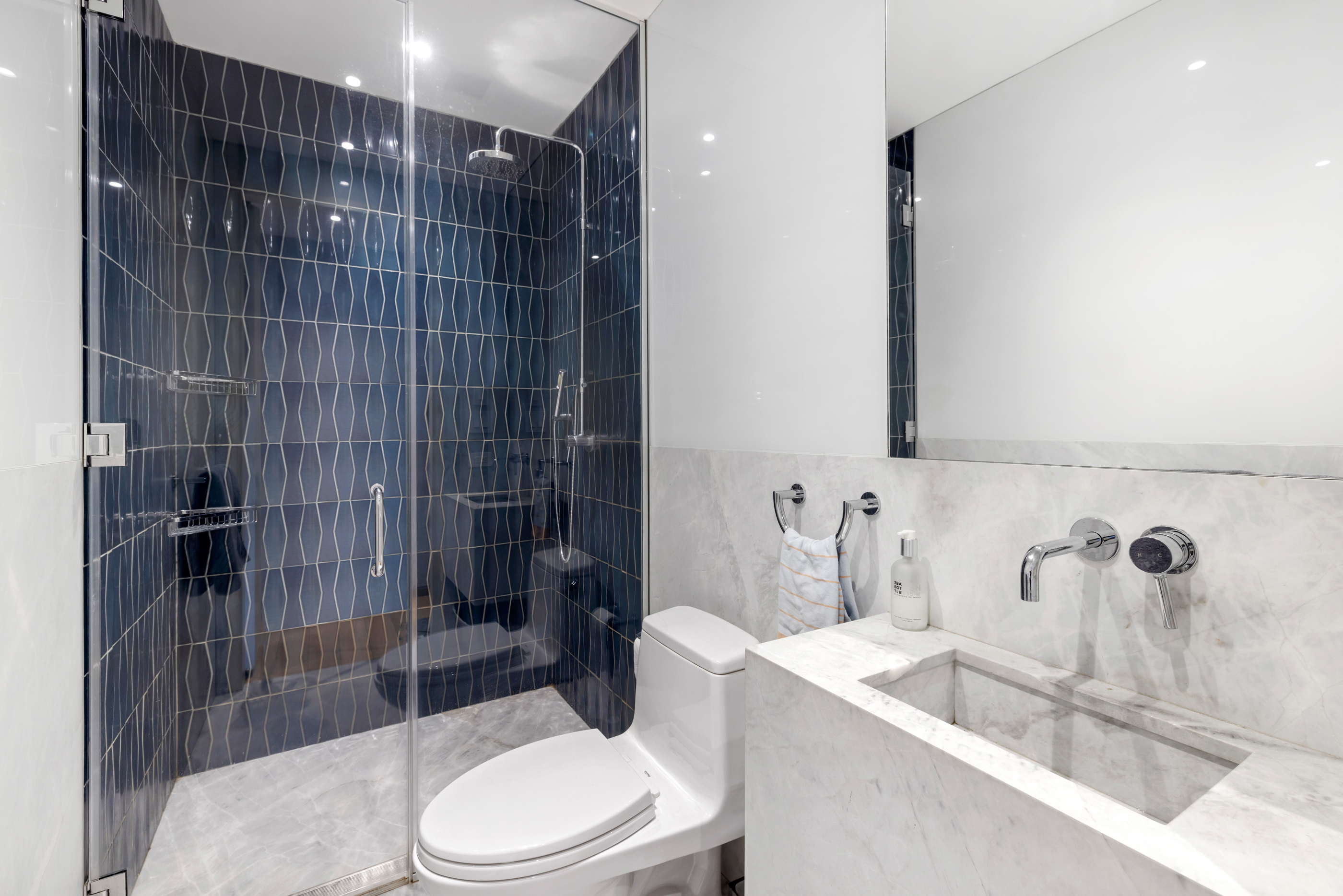 210 Pacific Street, Unit 6 Brooklyn, NY 11201 - Photo 16 of 20 a bathroom with a sink toilet and shower