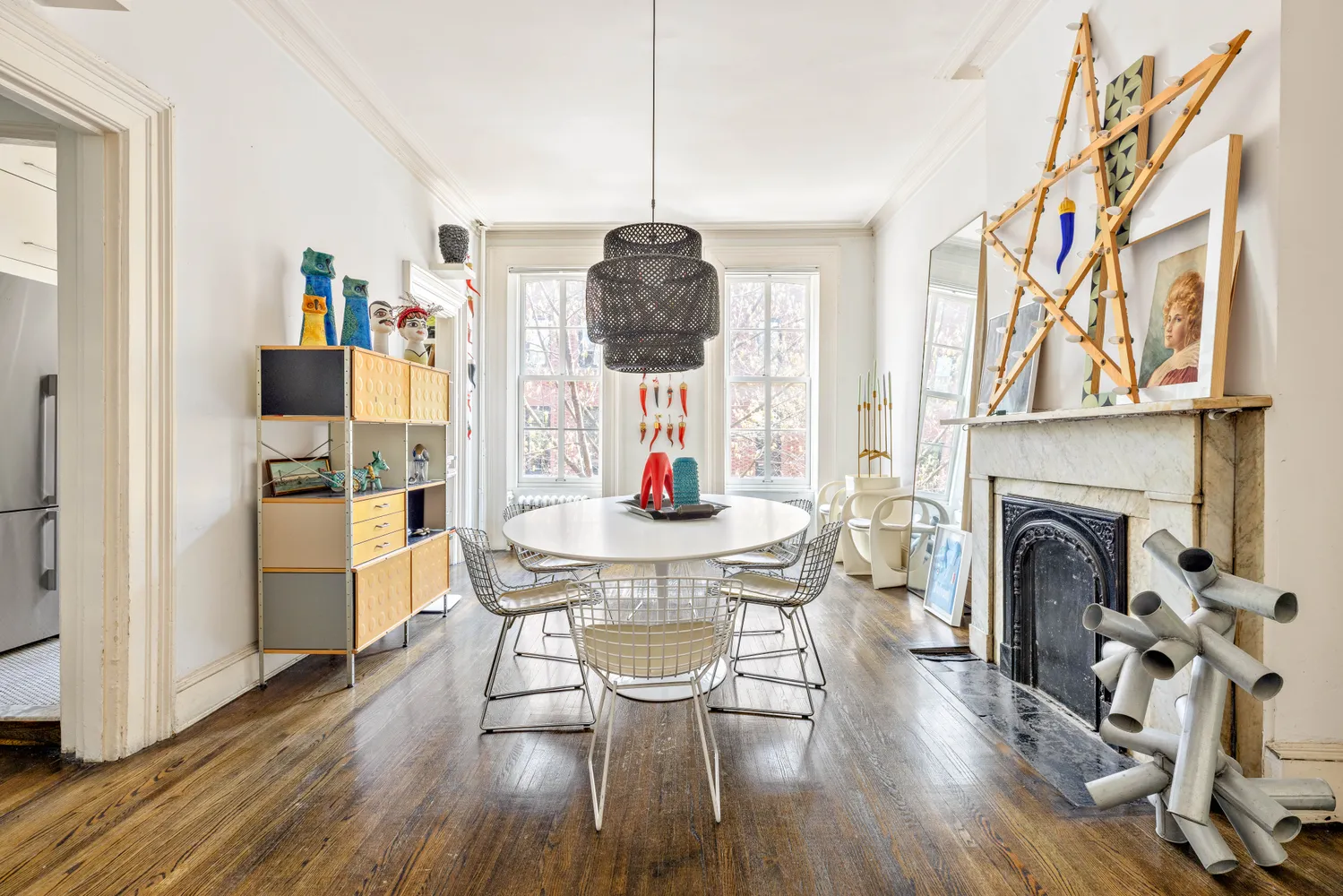 a dining room with furniture window wooden floor