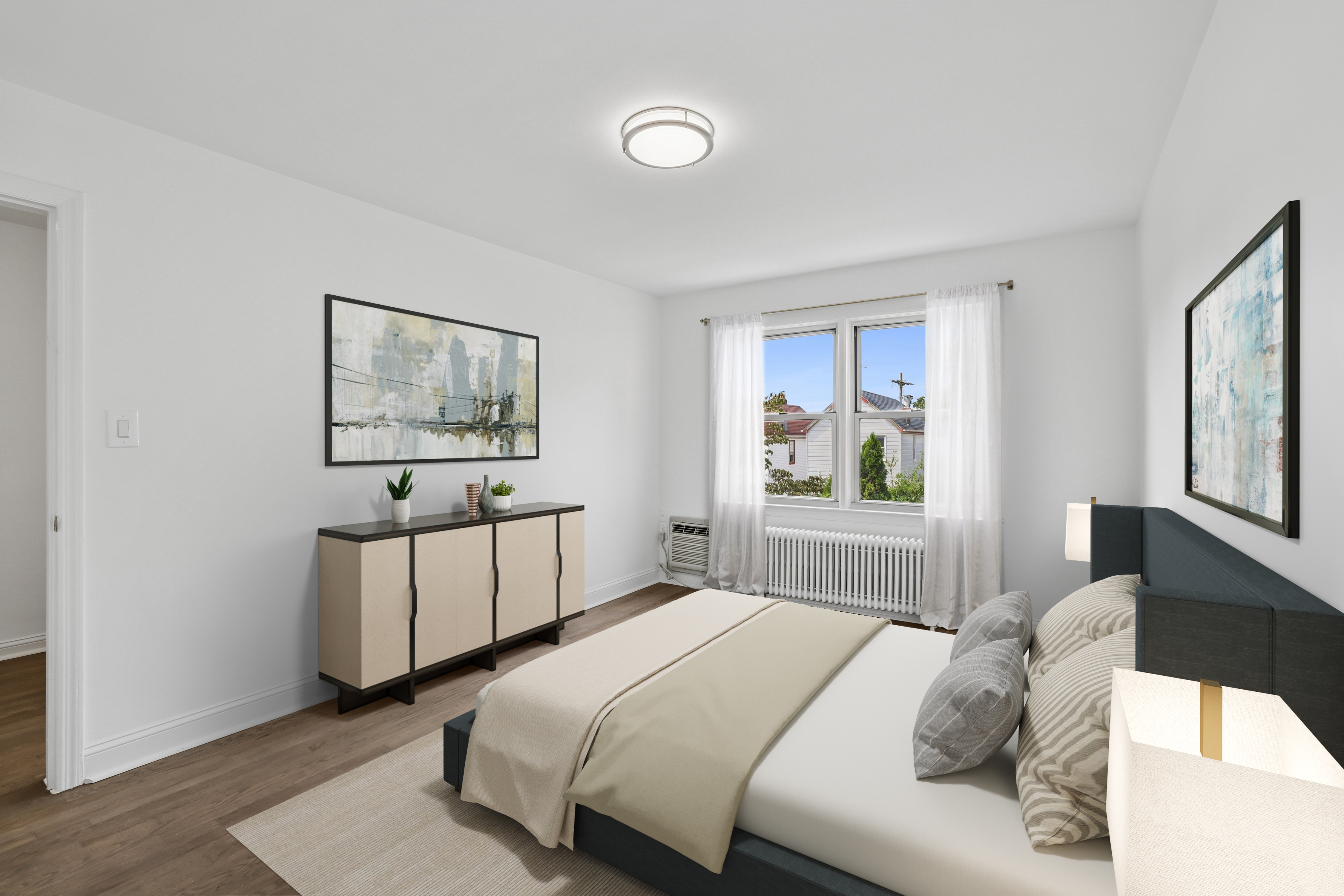 89-36 Springfield Boulevard Queens, NY 11427 - Photo 6 of 13 a bedroom with a bed and a painting on the wall