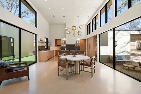 a view of a livingroom with furniture and a table