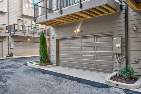 a view of a garage of the house