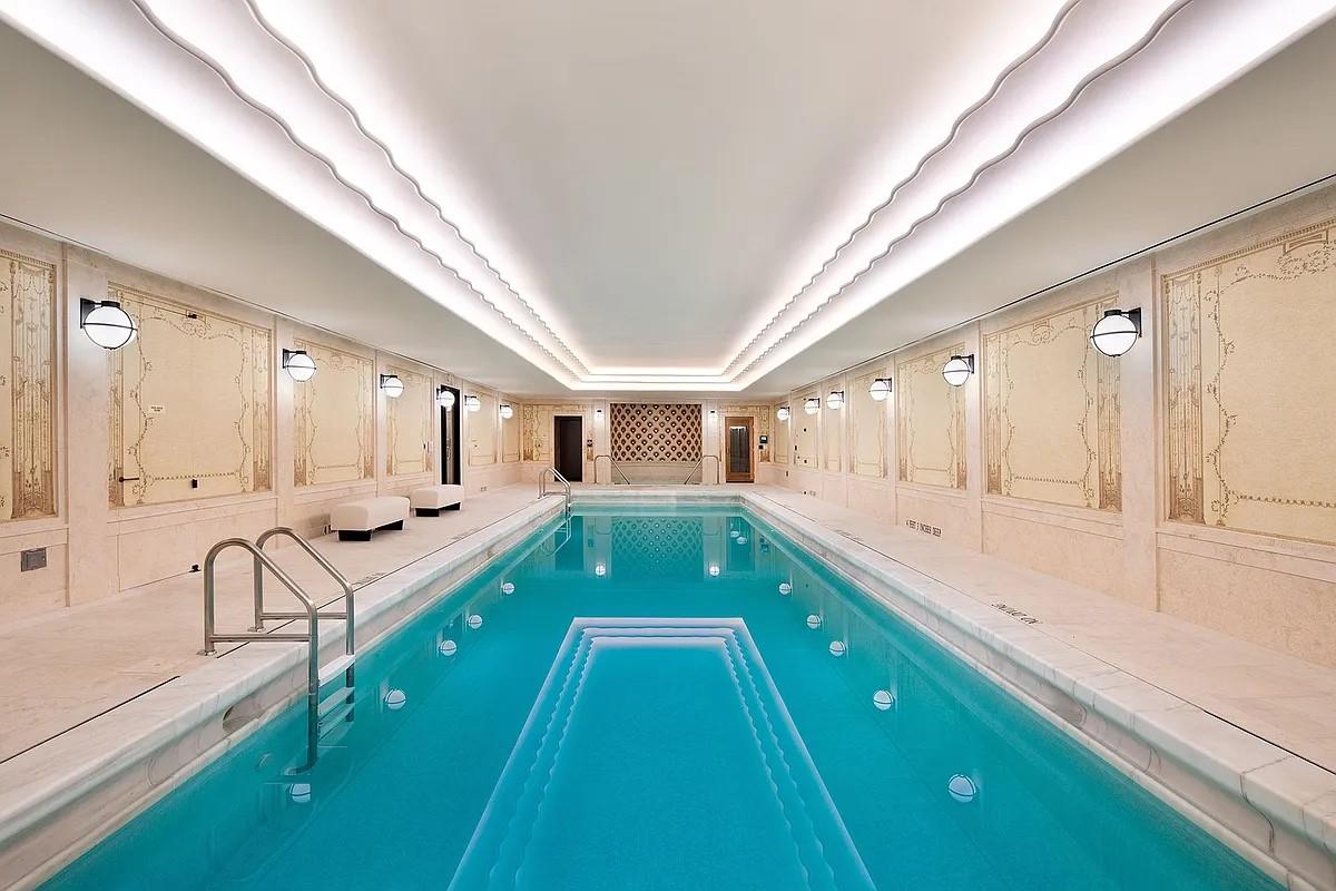 2 Park Place, Unit 35A Manhattan, NY 10007 - Photo 18 of 21 a bathroom with a sink a large mirror and a bathtub