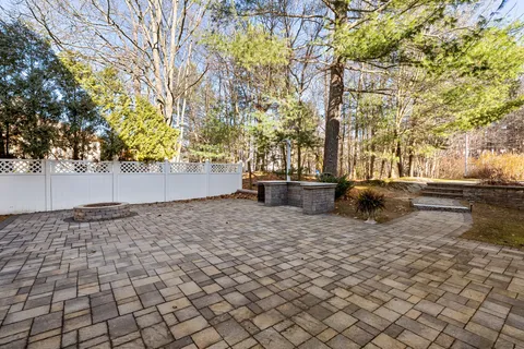 a backyard of a house with lots of green space