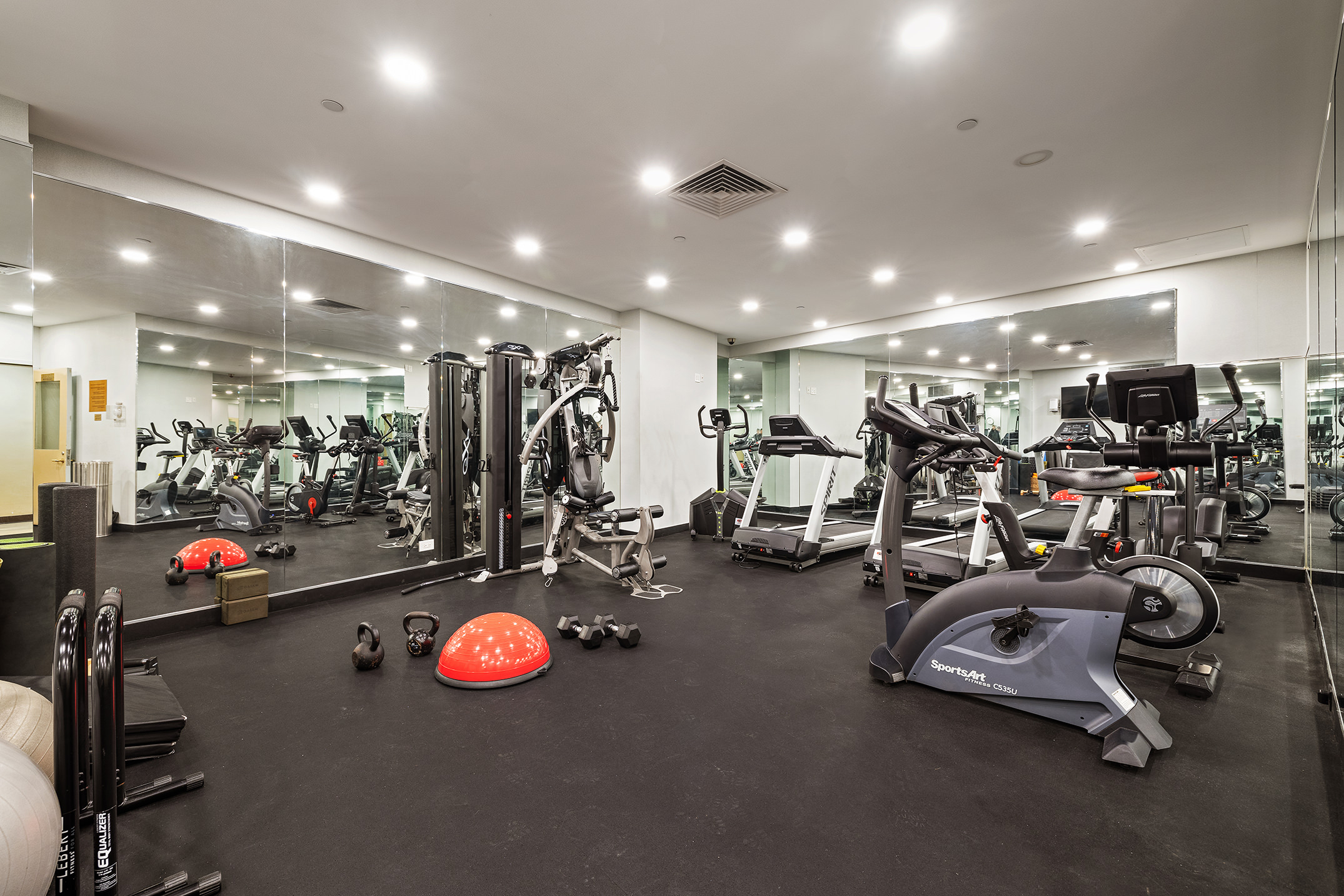 22 West 15th Street, Unit 10G Manhattan, NY 10011 - Photo 6 of 11 a view of a room with gym equipment
